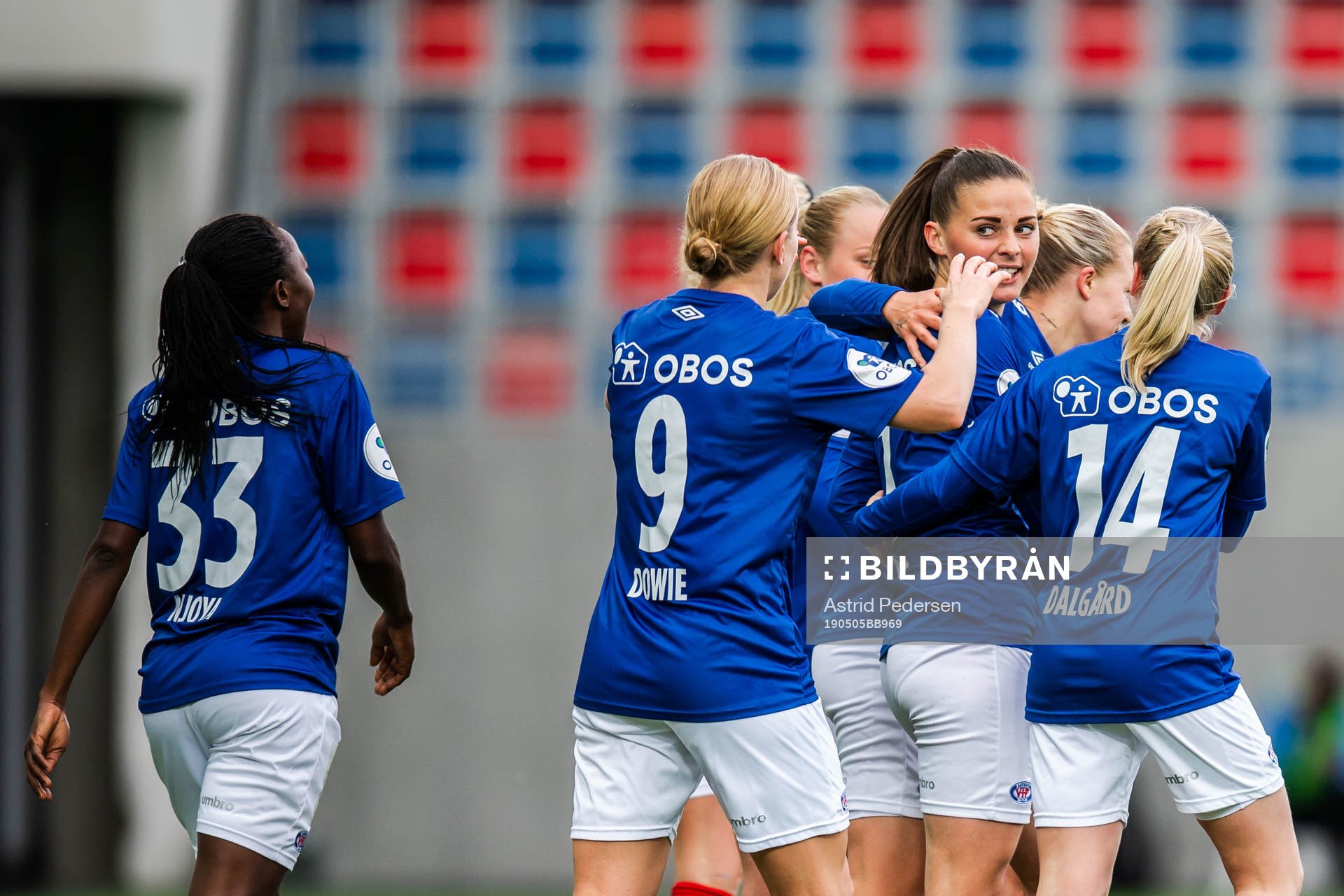 Jenna Dear celebrates with Ajara Njoya, Natasha Dowie and
