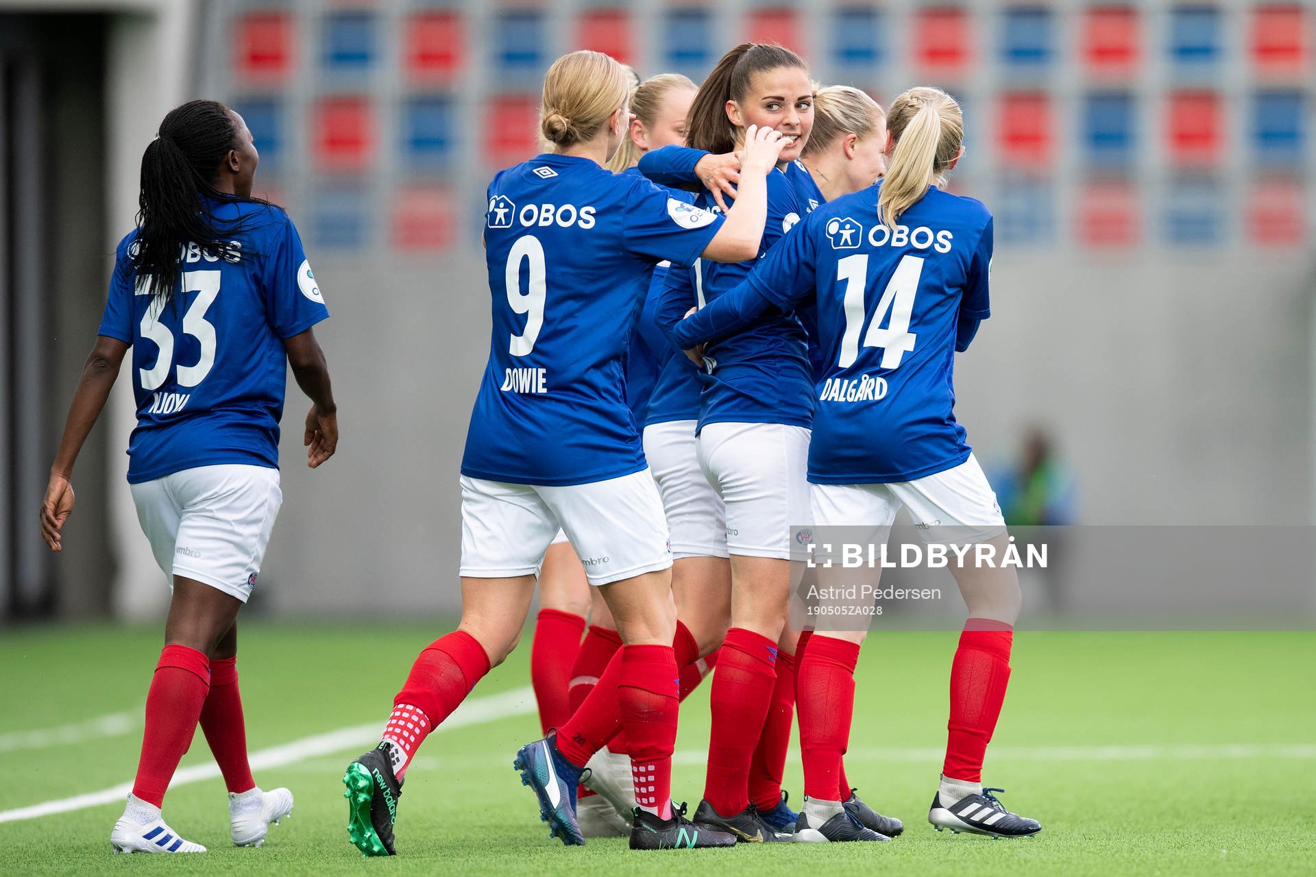 Jenna Dear celebrates with Ajara Njoya, Natasha Dowie and