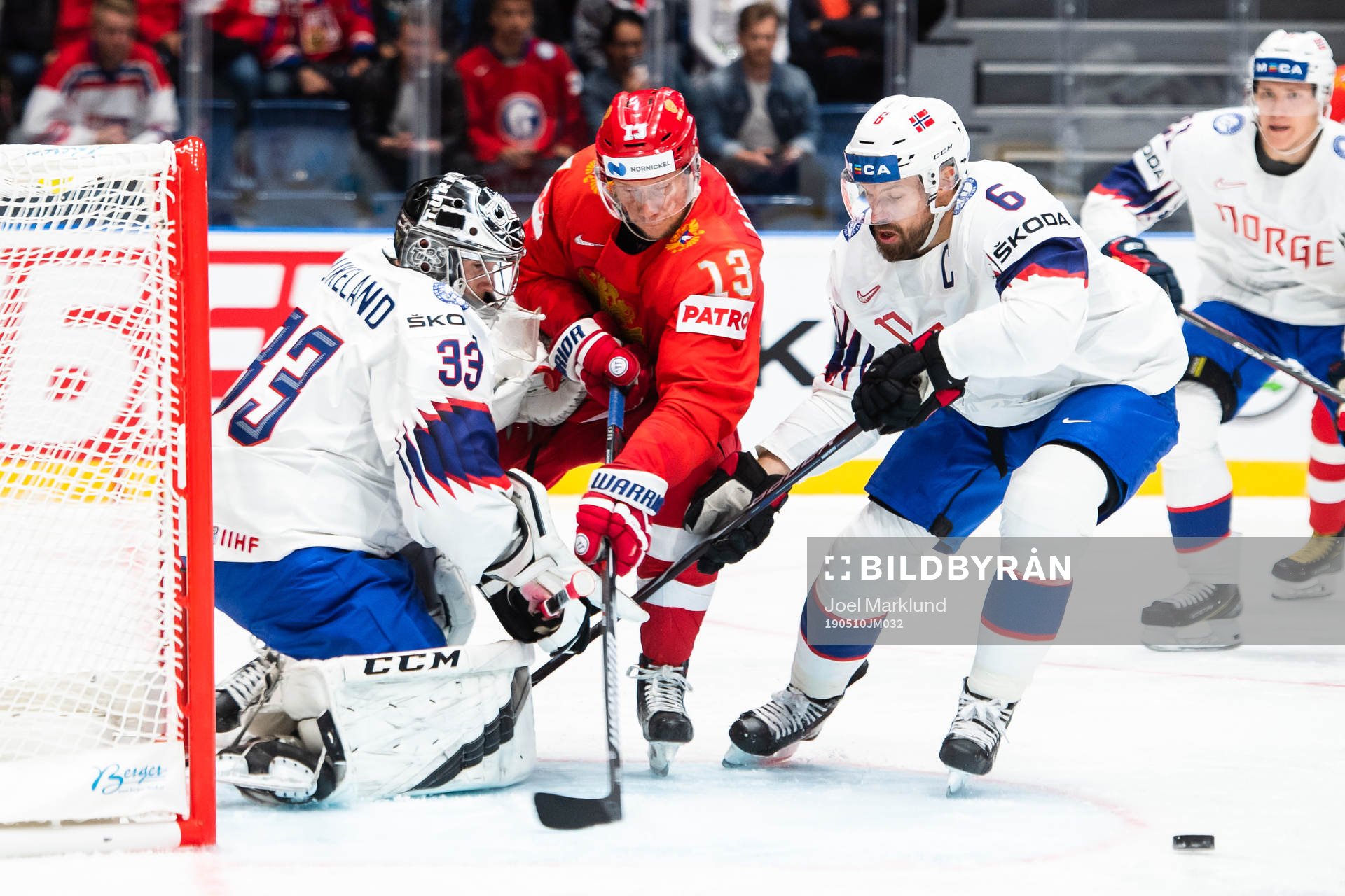 Sergei Andronov of Russia against goaltender Henrik