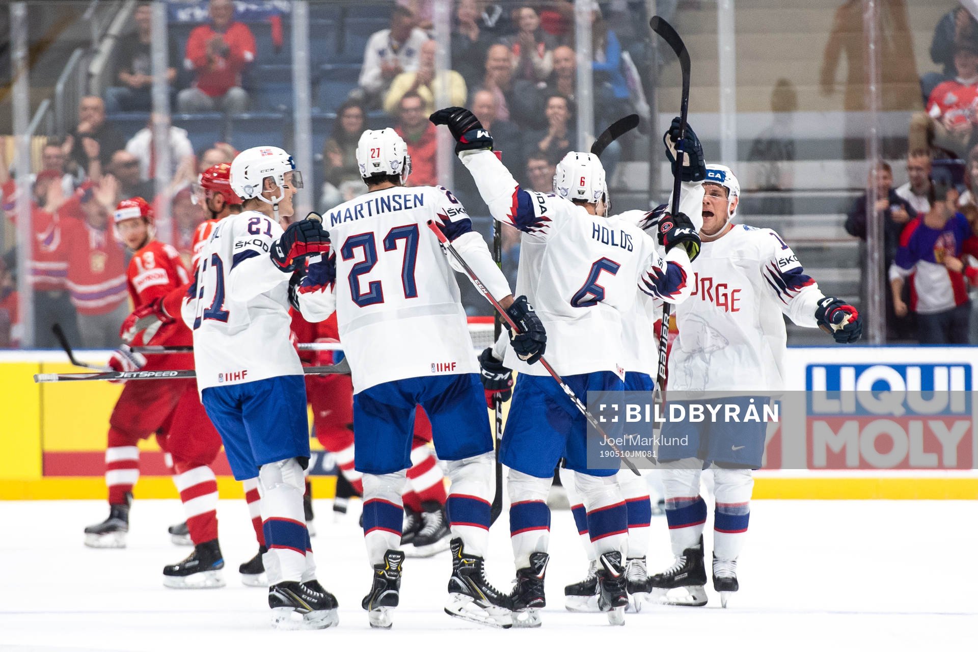 Jonas Holøs of Norway celebrate with Christian Bull ,