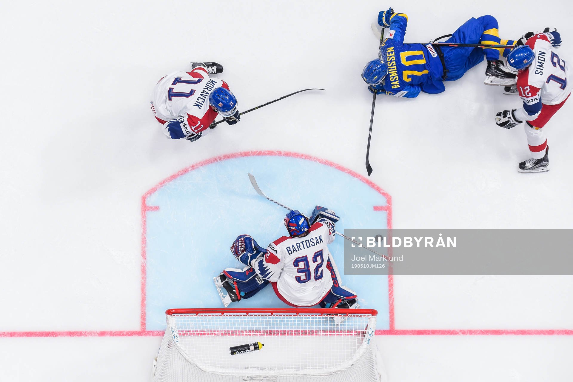 Dennis Rasmussen of Sweden against Michal Moravcik, Dominik