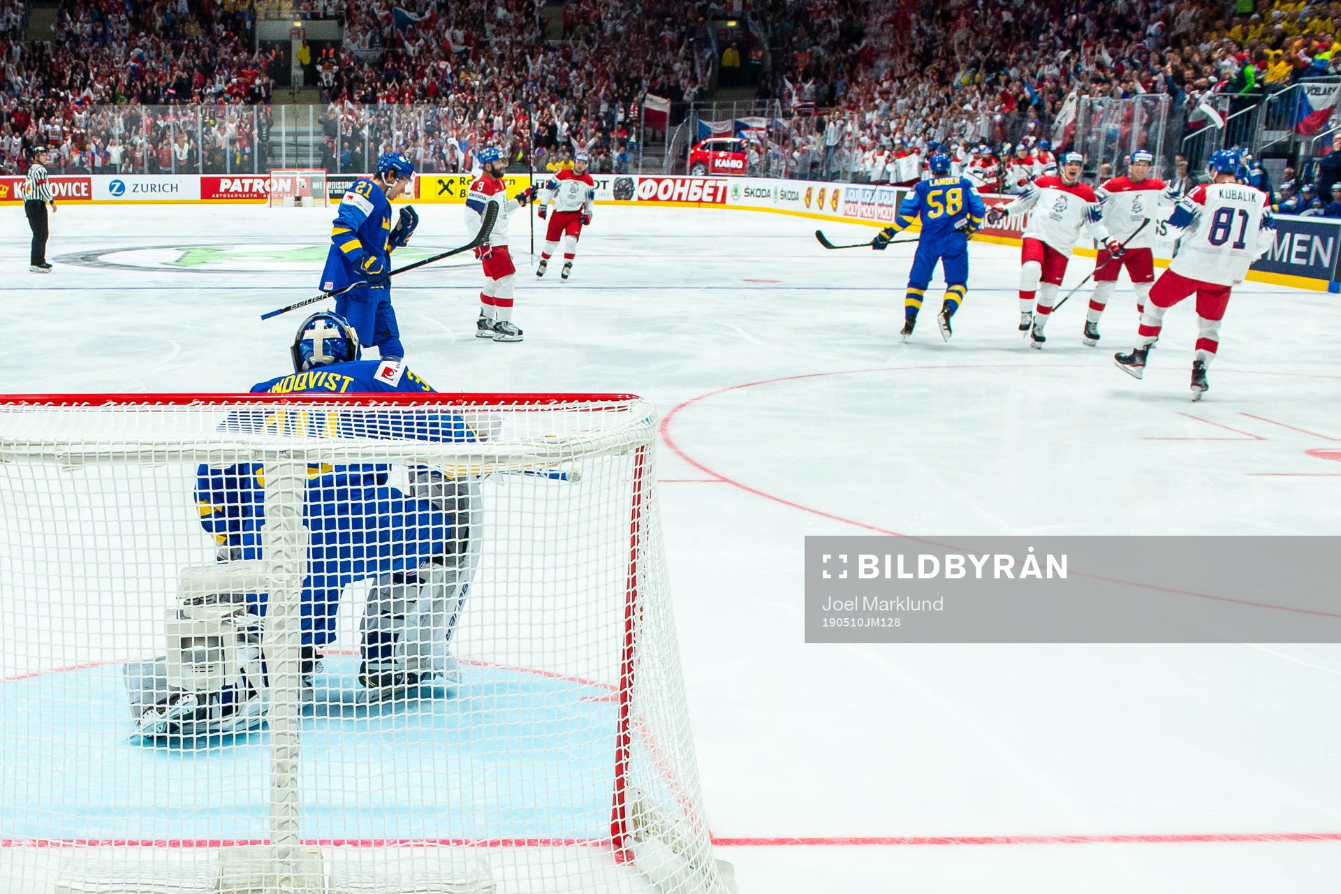 Goaltender Henrik Lundqvist of Sweden looks dejected