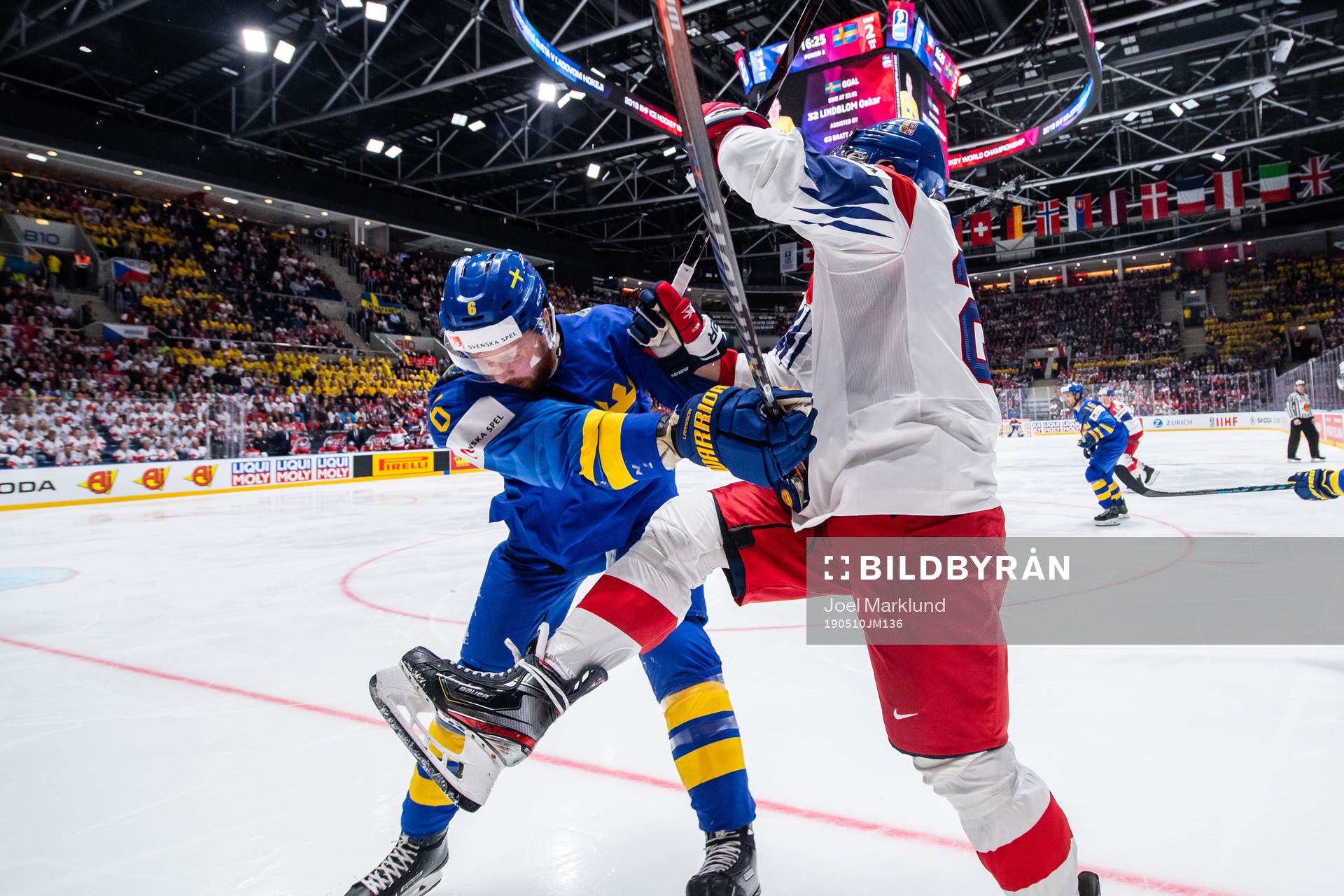 Adam Larsson of Sweden against Dmitrij Jaskin of Czech