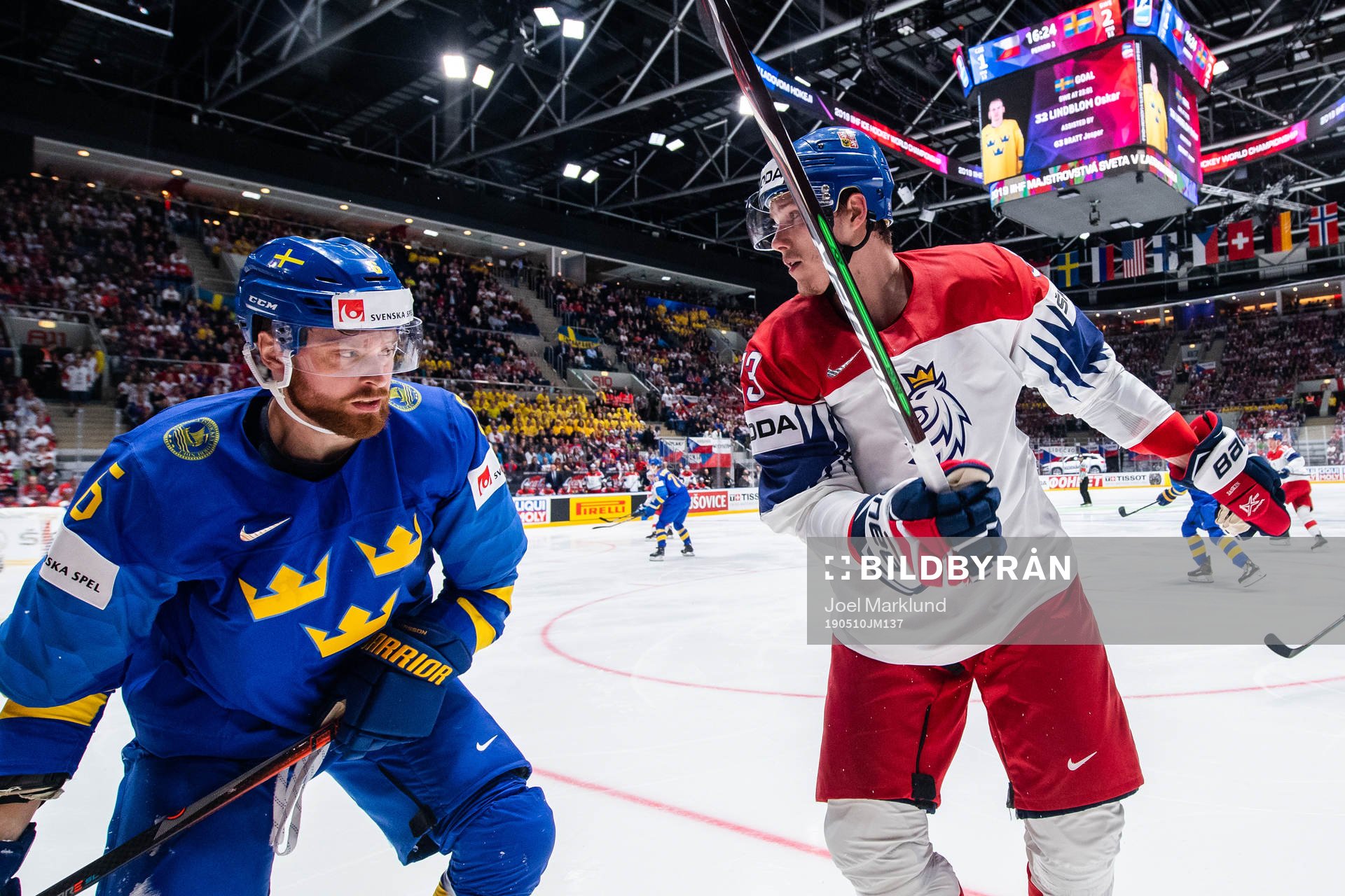 Adam Larsson of Sweden against Dmitrij Jaskin of Czech