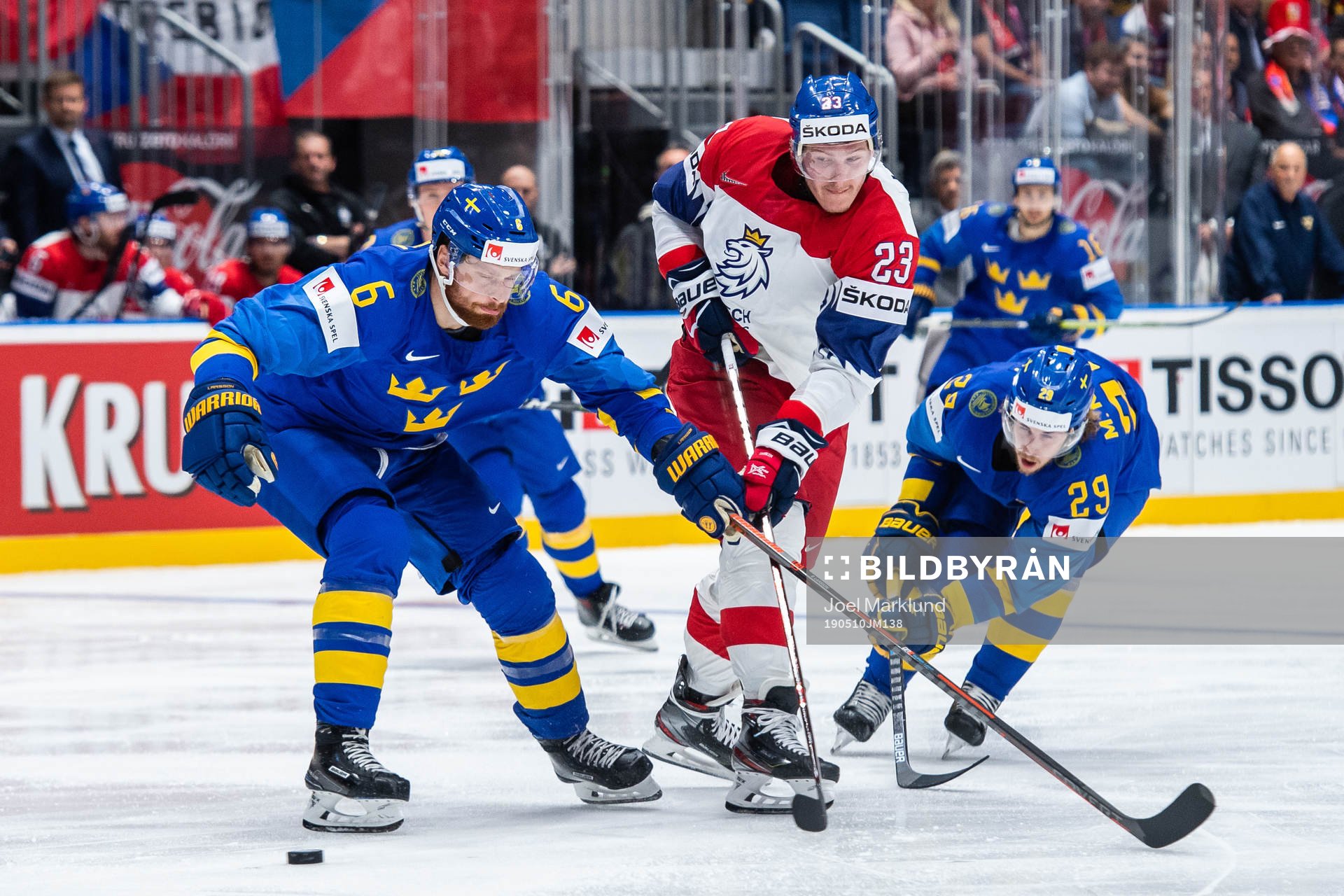 Adam Larsson and Mario Kempe of Sweden against Dmitrij