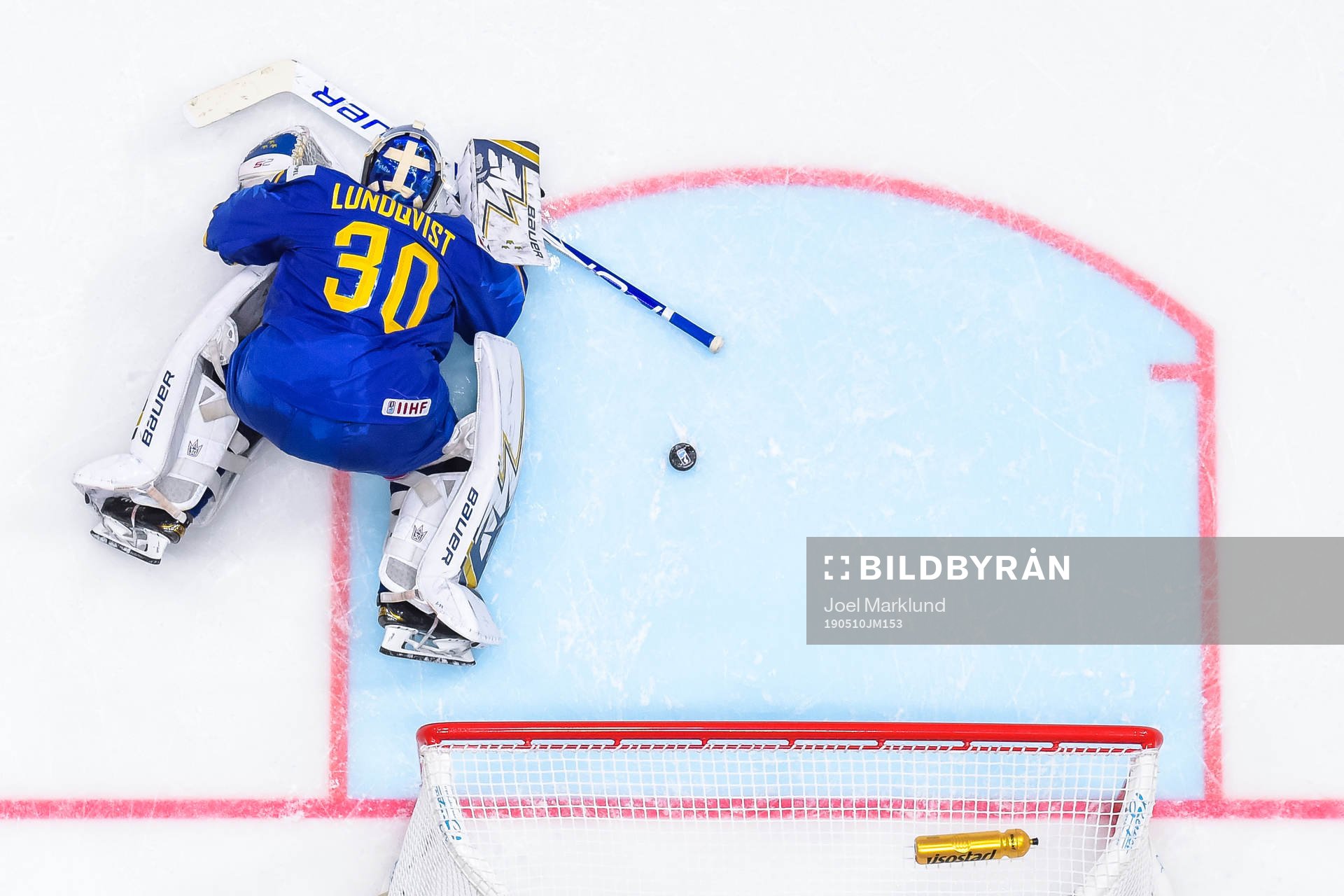 Goaltender Henrik Lundqvist of Sweden looks dejected