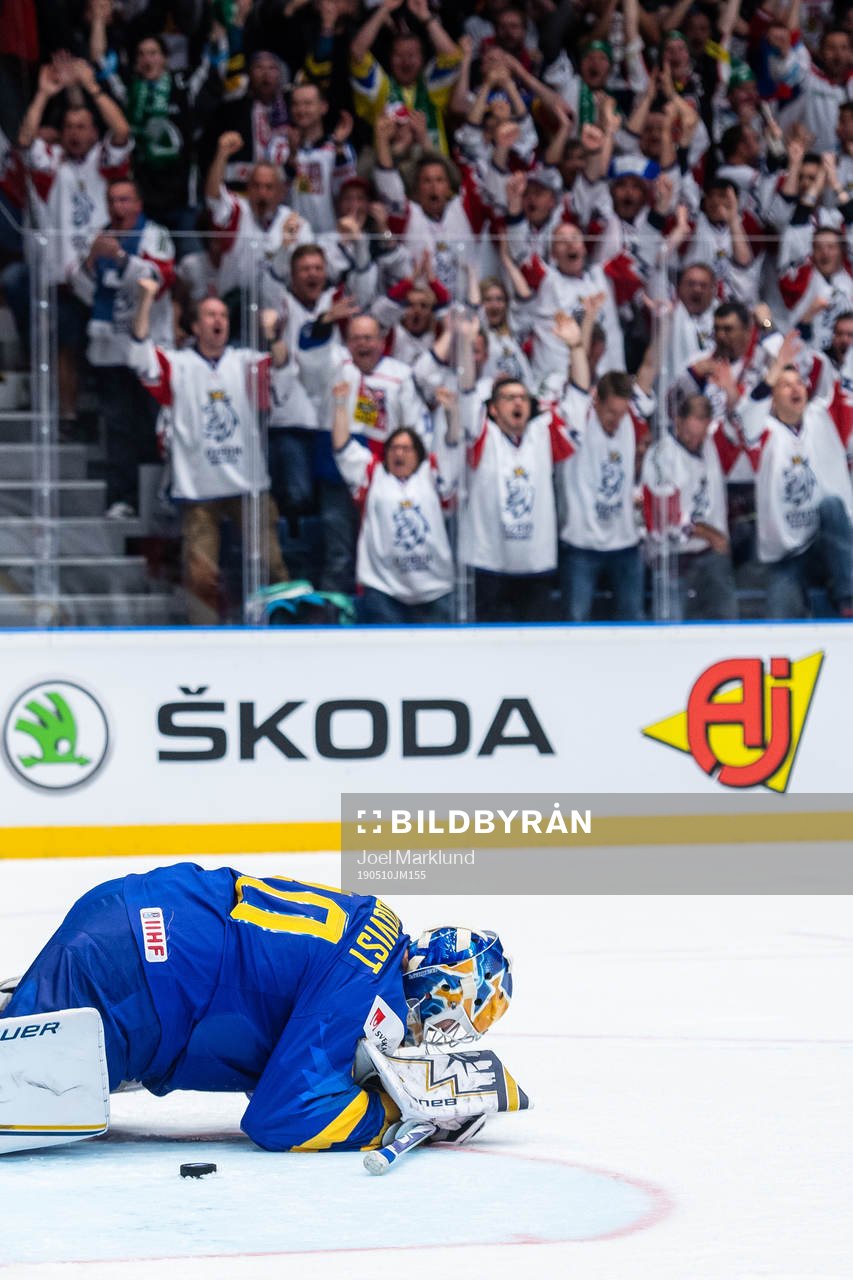 Goaltender Henrik Lundqvist of Sweden looks dejected