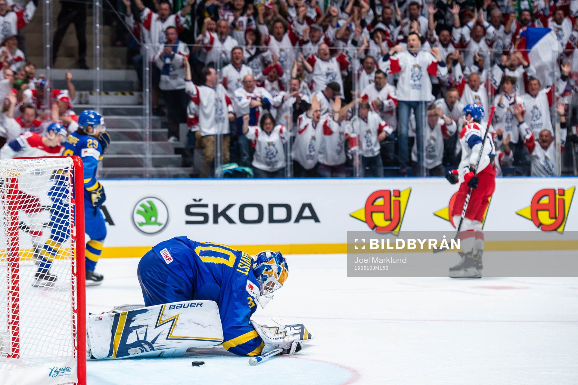 Goaltender Henrik Lundqvist of Sweden looks dejected