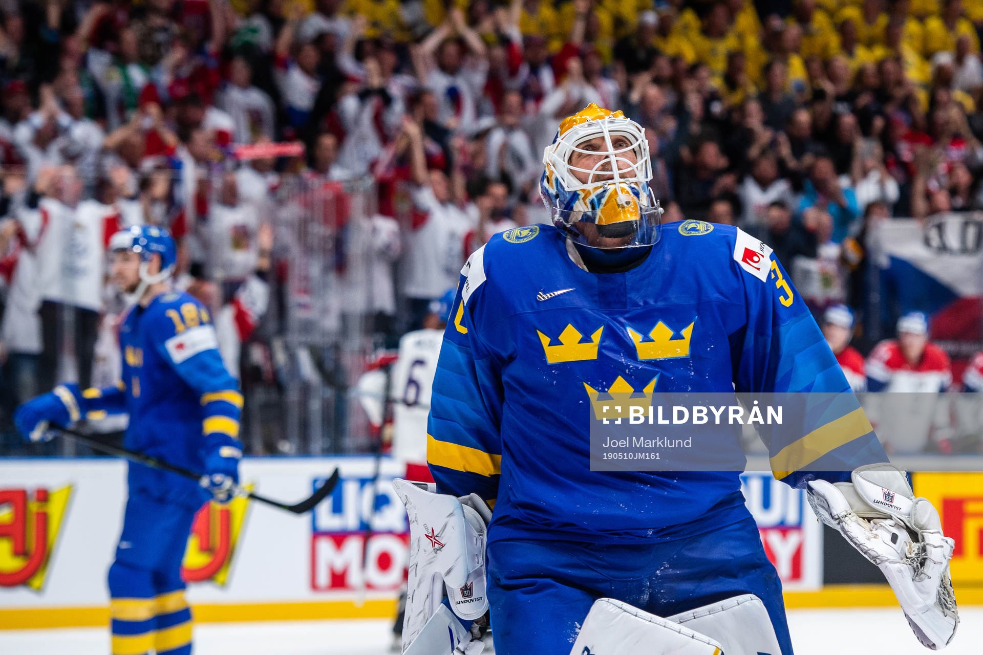 Goaltender Henrik Lundqvist of Sweden looks dejected