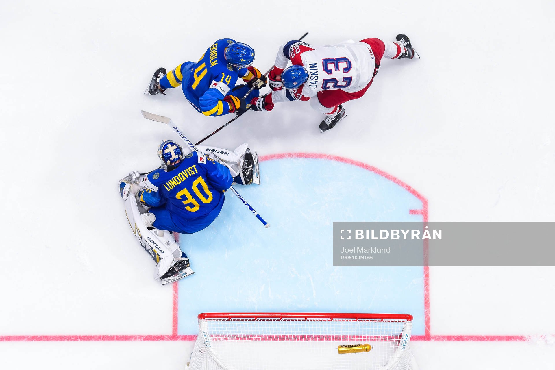Goaltender Henrik Lundqvist and Mattias Ekholm of Sweden