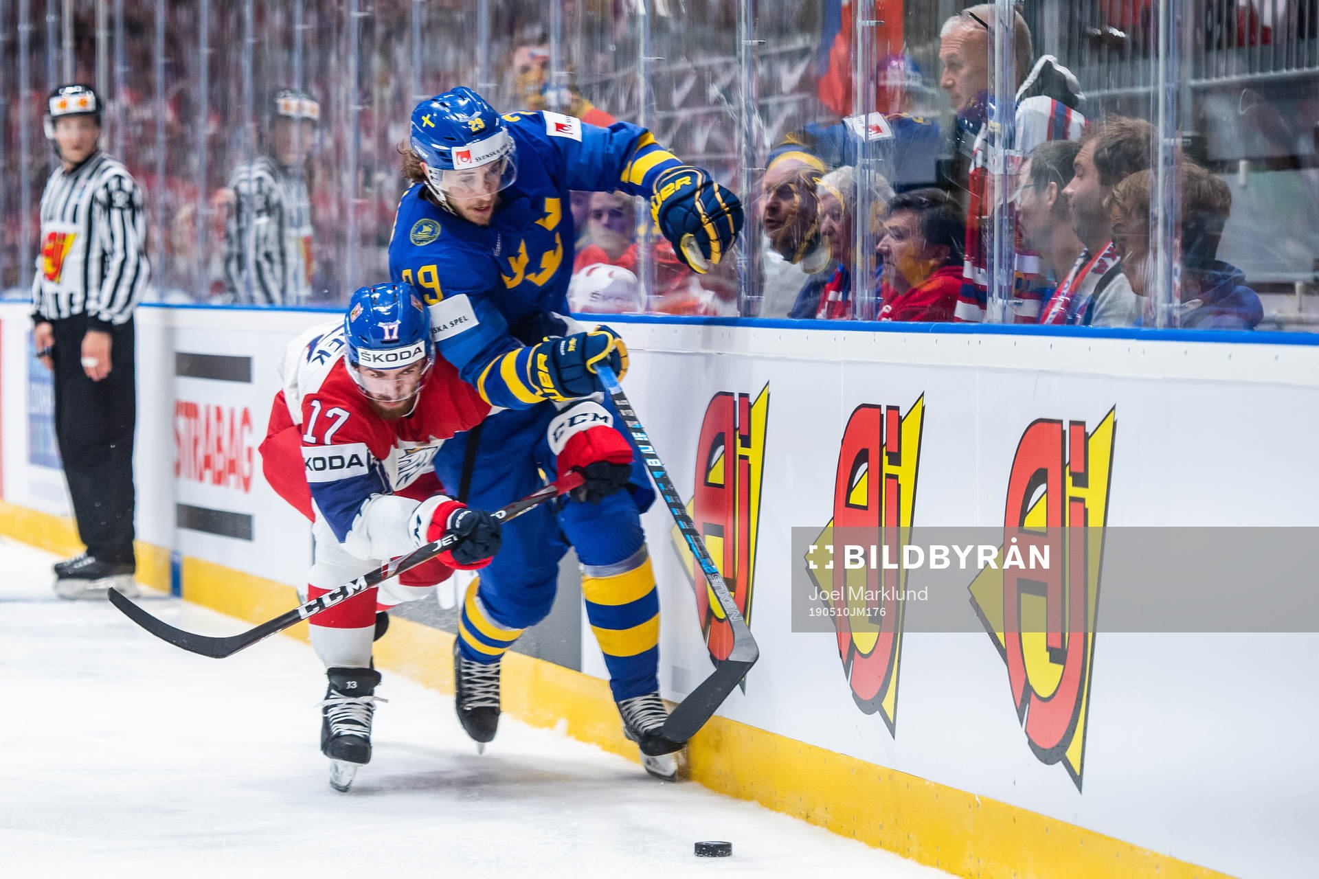 Mario Kempe of Sweden in action with Filip Hronek of Czech