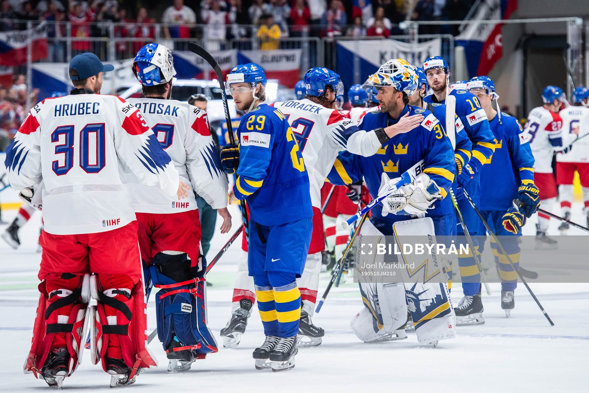Jakub Voracek of Czech Republic and Henrik Lundqvist and
