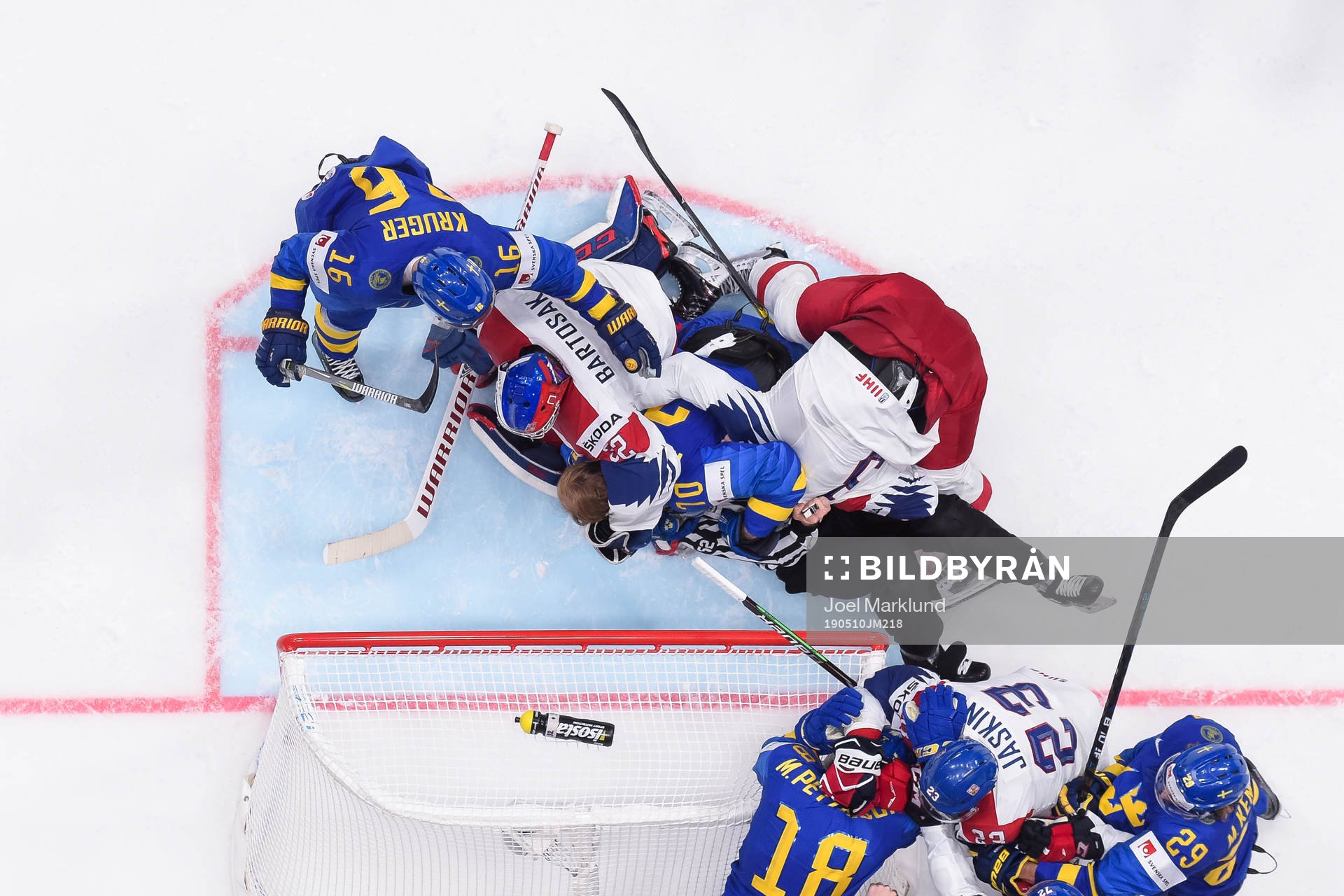 Goaltender Patrik Bartosak and Radko Gudas of Czech