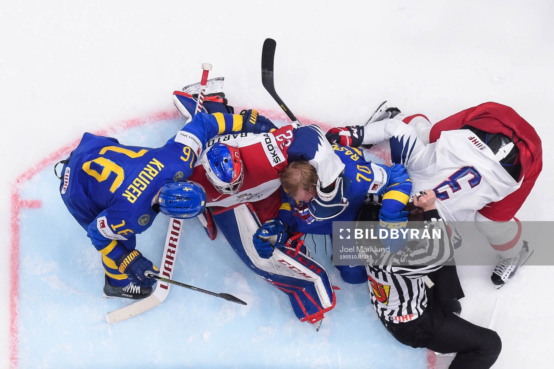 Goaltender Patrik Bartosak and Radko Gudas of Czech