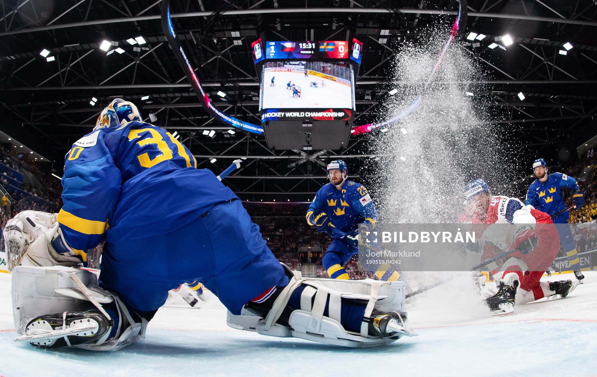 Goaltender Henrik Lundqvist of Sweden and Jan Kovar of