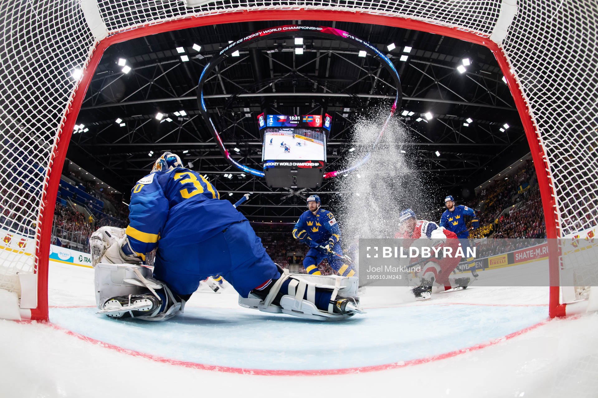 Goaltender Henrik Lundqvist of Sweden and Jan Kovar of