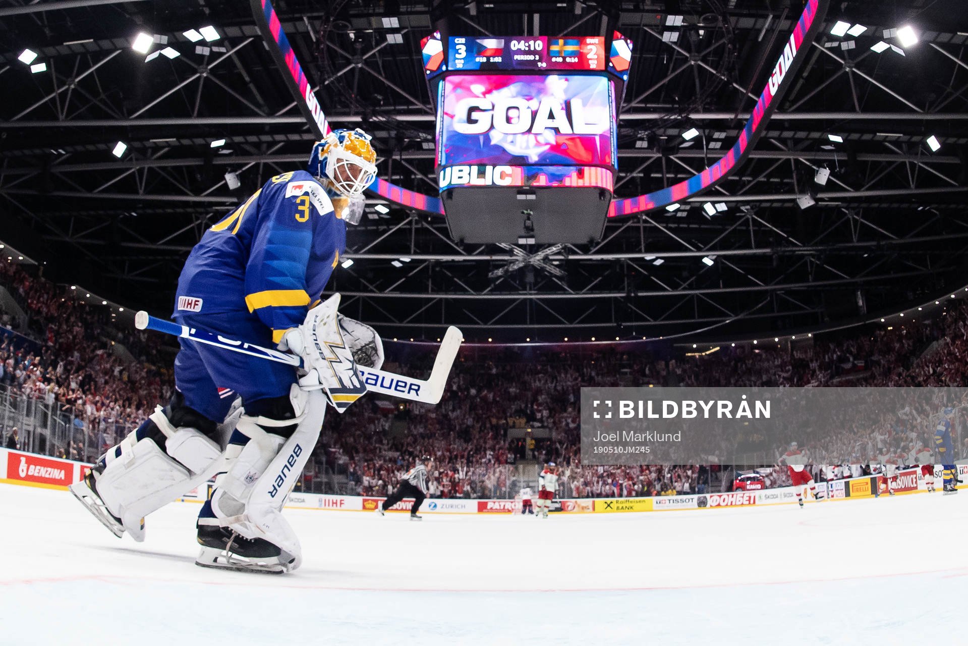 Goaltender Henrik Lundqvist of Sweden looks dejected
