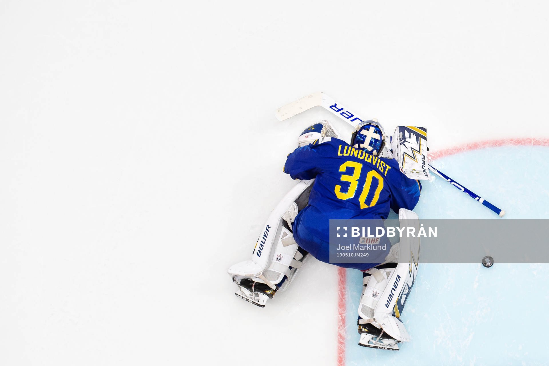 Goaltender Henrik Lundqvist of Sweden looks dejected