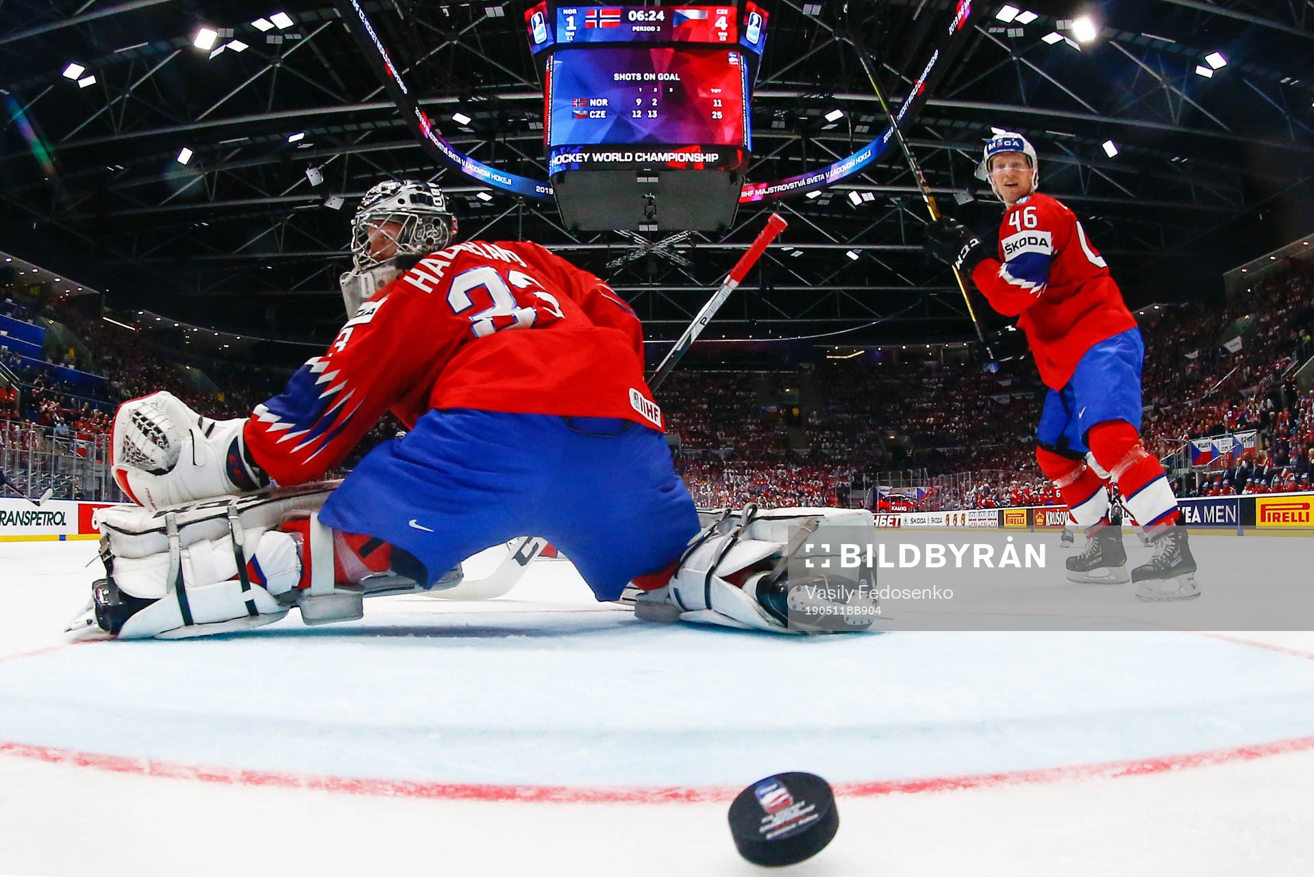 Goaltender Henrik Haukeland of Norway lets in the 1-5 goal