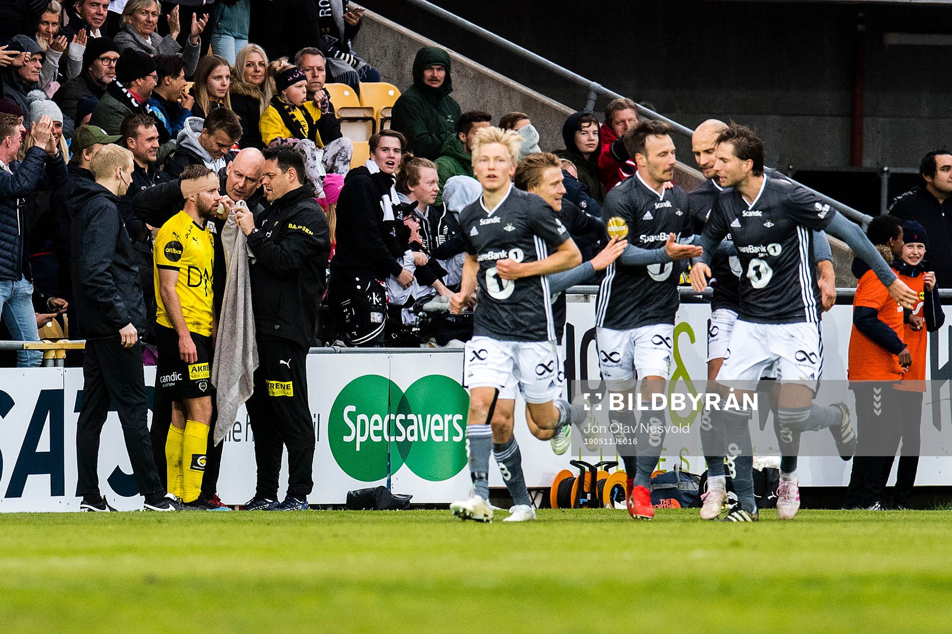 Simen Rafn of Lillestrøm  and players of Rosenborg