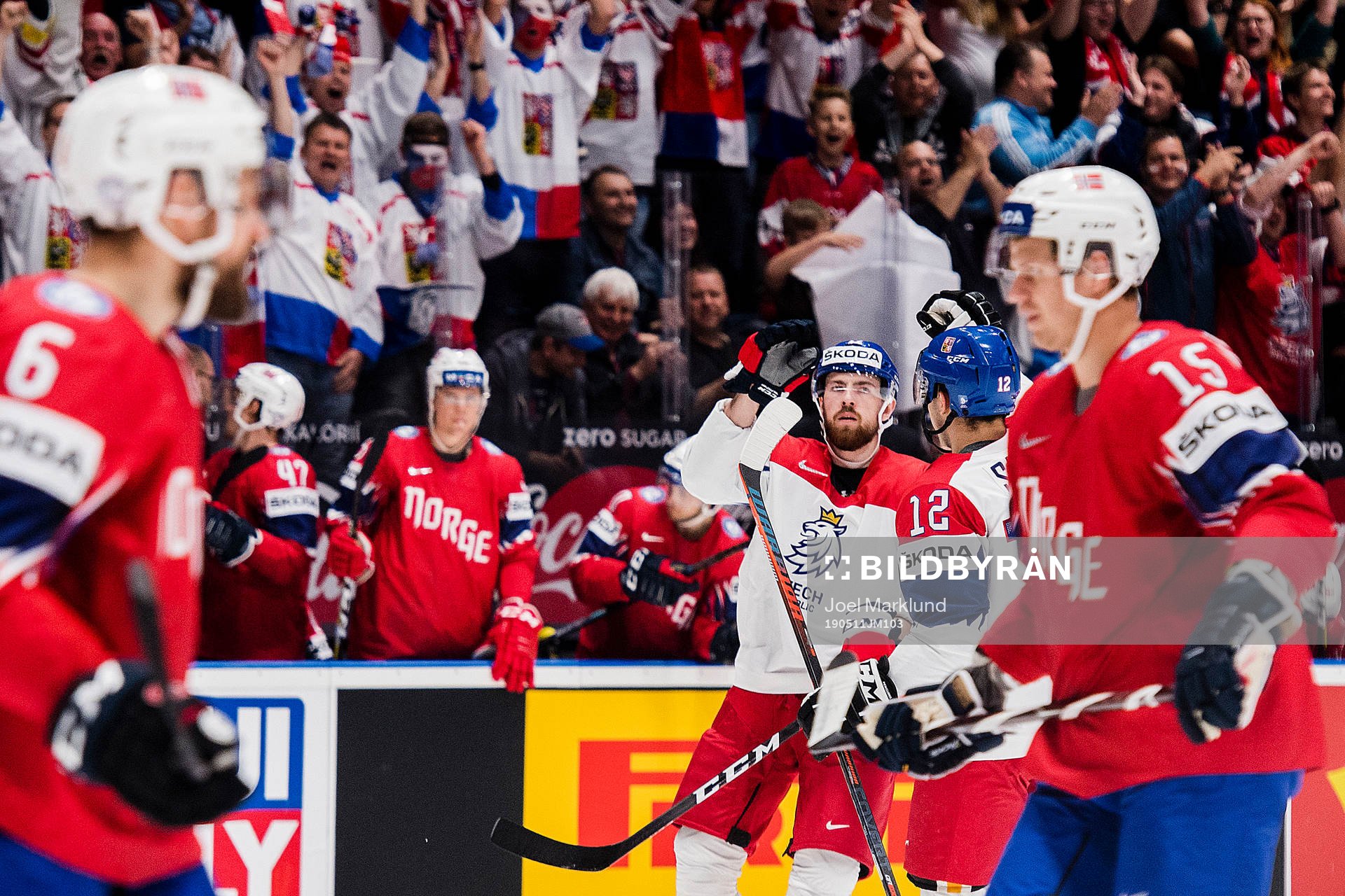 Filip Hronek and Dominik Simon of Czech Republic celebrates