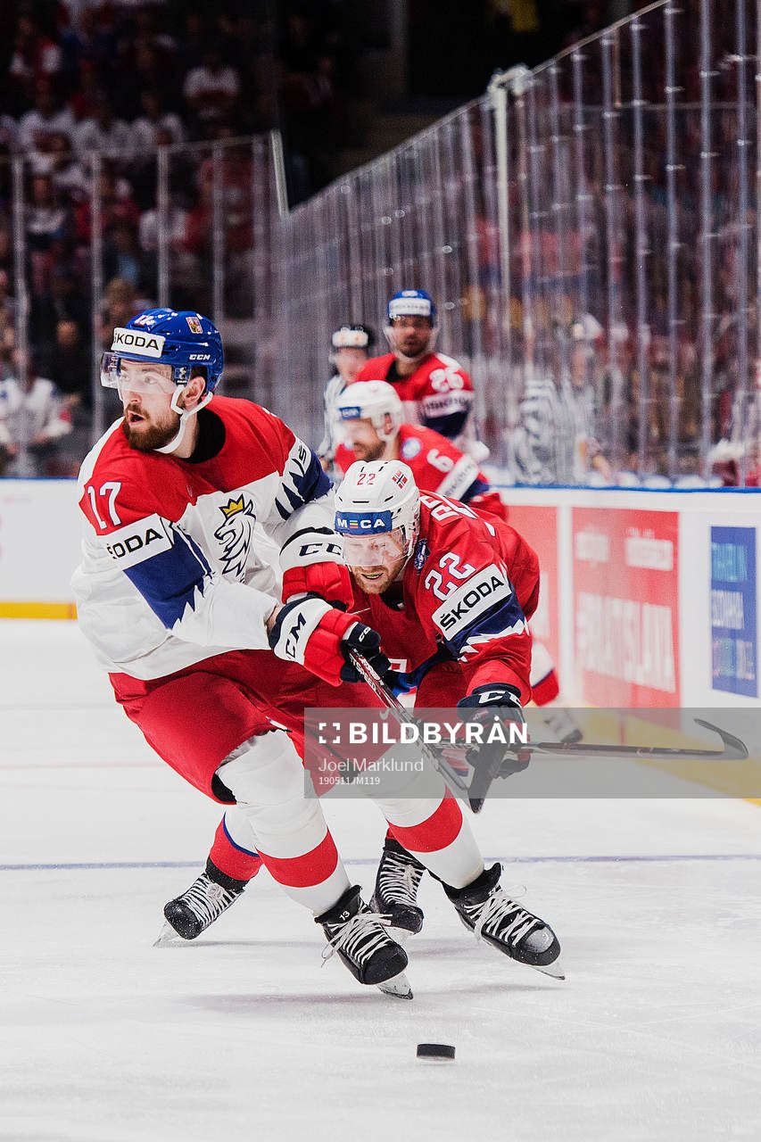 Filip Hronek of Czech Republic and Martin Røymark of Norway