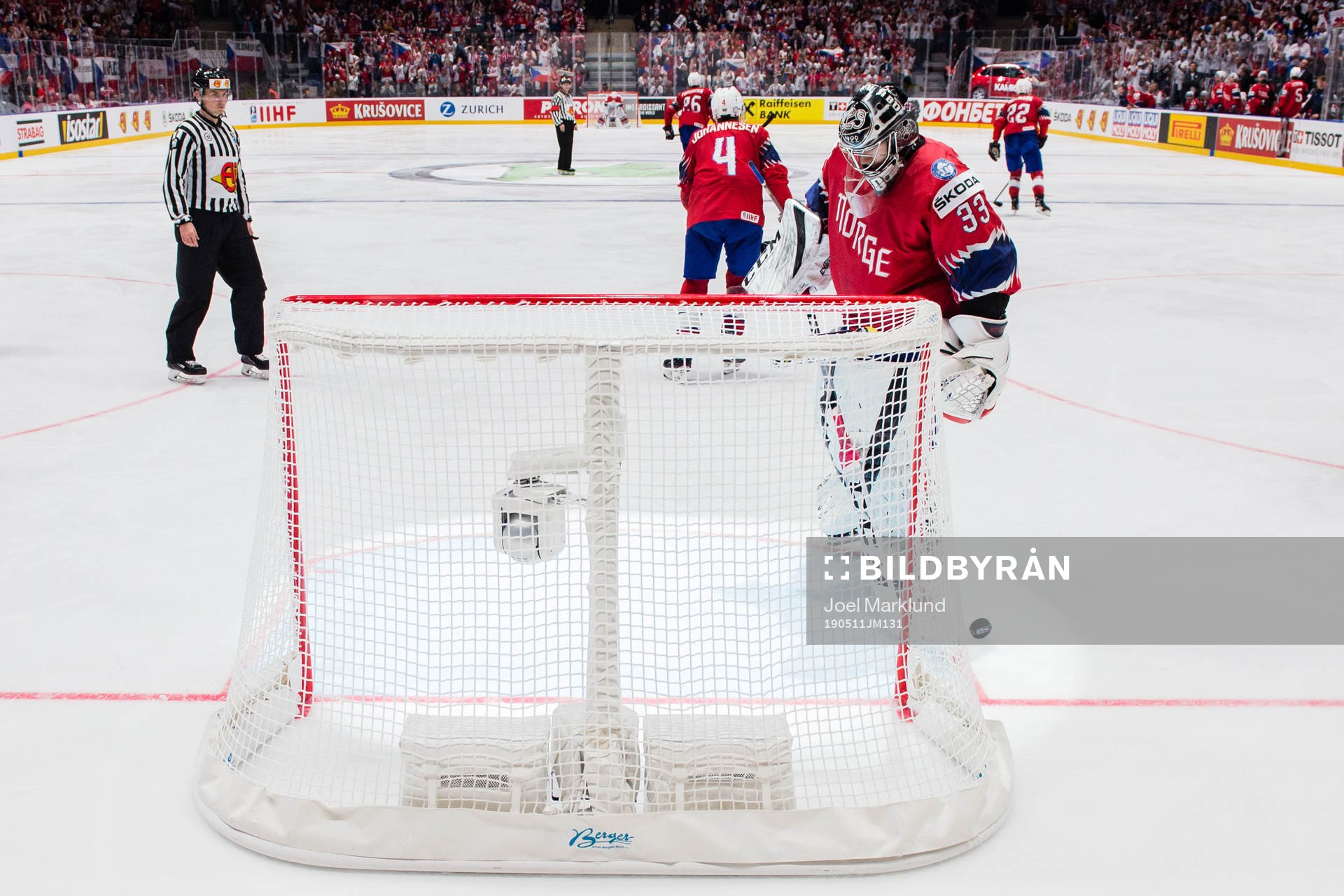 Goaltender Henrik Haukeland of Norway looks dejected