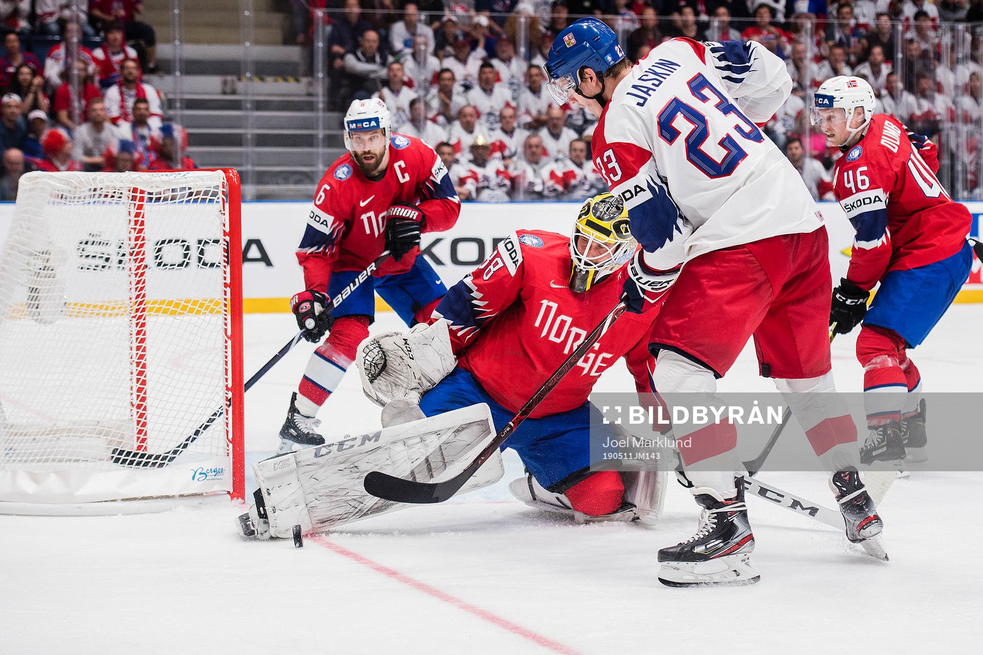 Jonas Holøs, goaltender Henrik Holm and Mathis Olimb