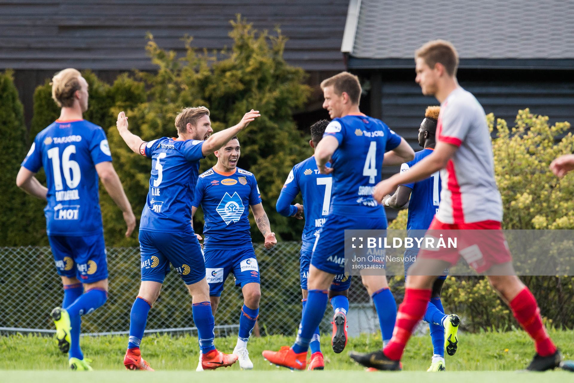 Pape Habib Gueye of Aalesund celebrates with teammates