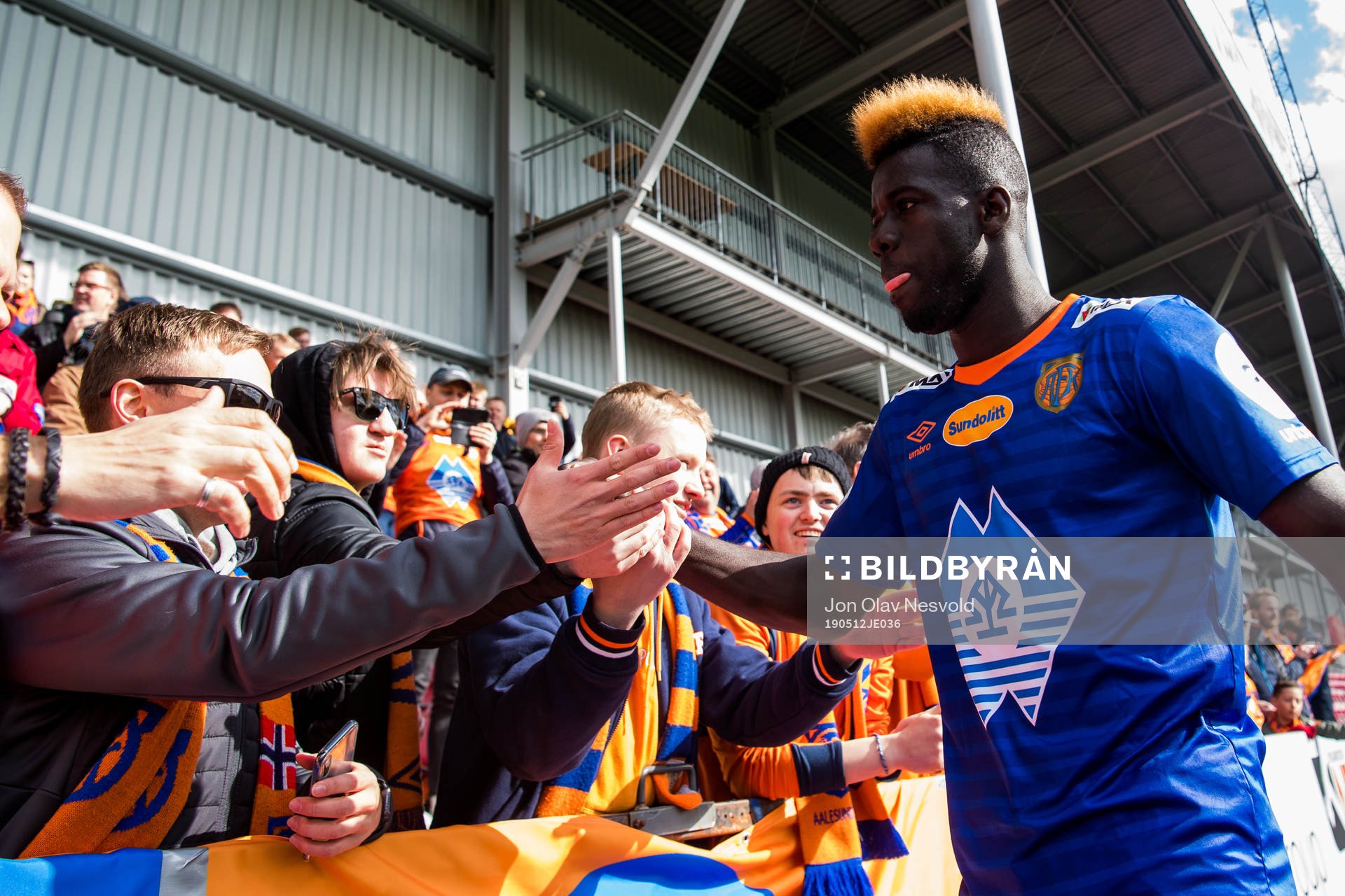 Pape Habib Gueye of Aalesund celebrates with the supporters