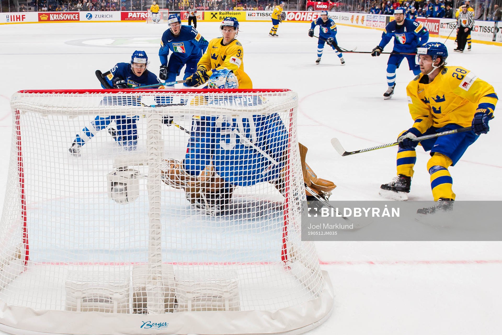 Oskar Lindblom and Elias Lindholm of Sweden and goaltender