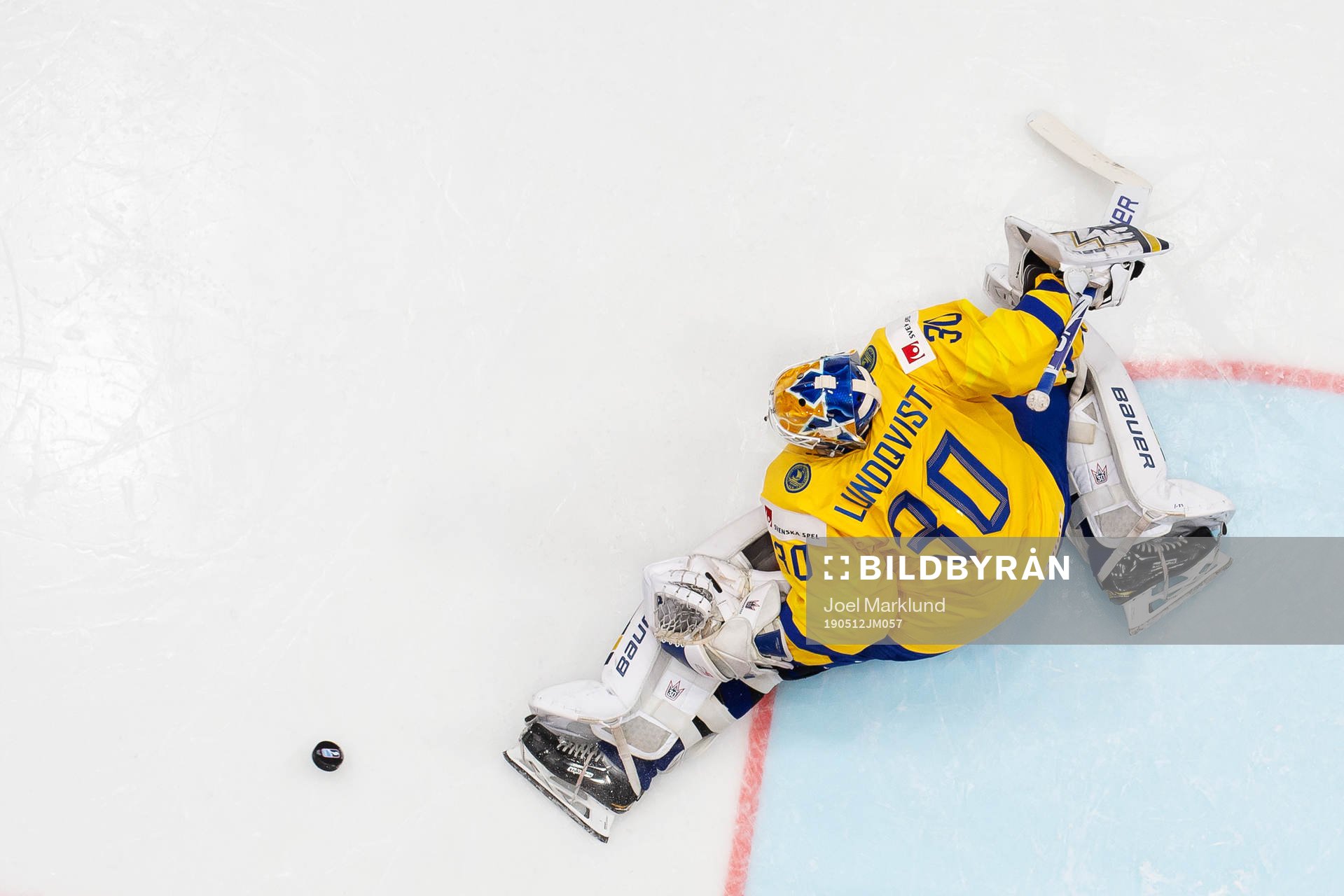 Goaltender Henrik Lundqvist of Sweden makes a save