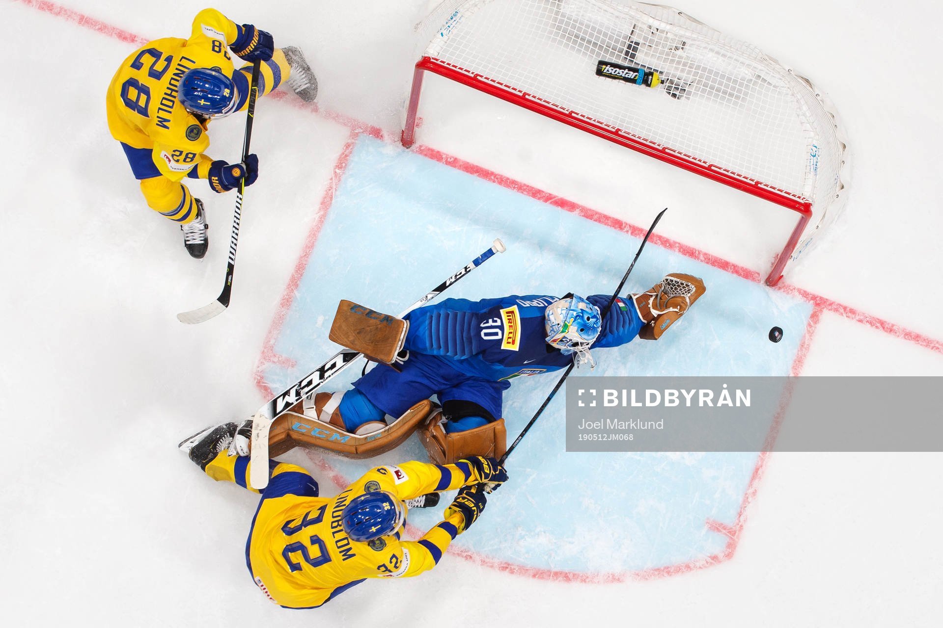 Elias Lindholm and Oskar Lindblom of Sweden in action