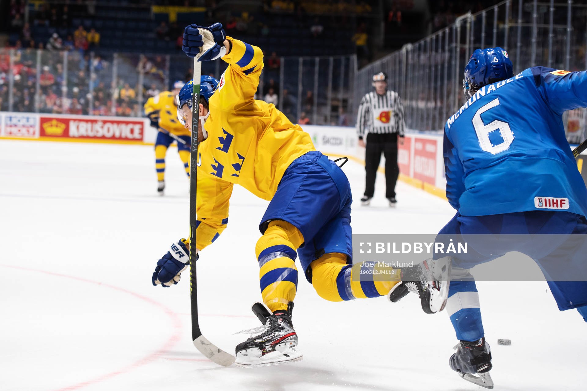 William Nylander of Sweden gets tackled by Sean McMonagle