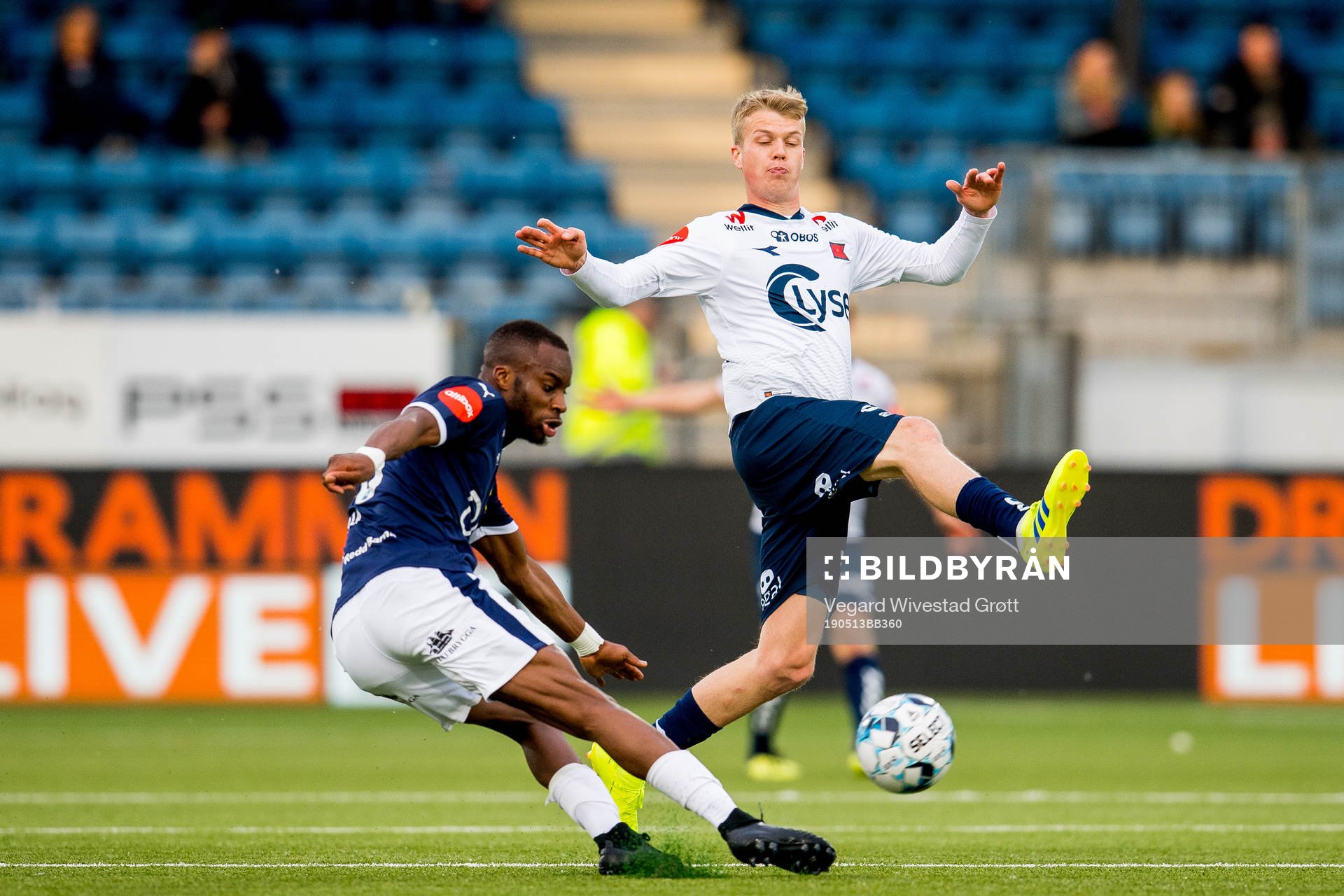Yacouba Sylla of Strømsgodset and Samuel Fridjonsson of