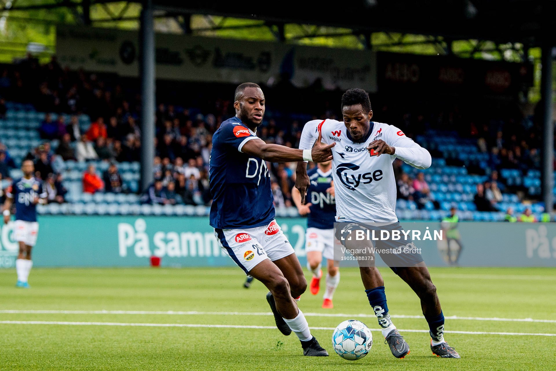 Yacouba Sylla of Strømsgodset and Usman Sale of Viking during the Eliteserien football match between Strømsgodset and Viking on May 13, 2019 in Drammen.