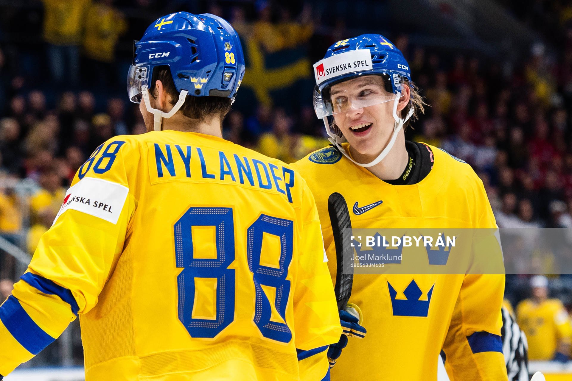 Oskar Lindblom and William Nylander of Sweden celebrate the