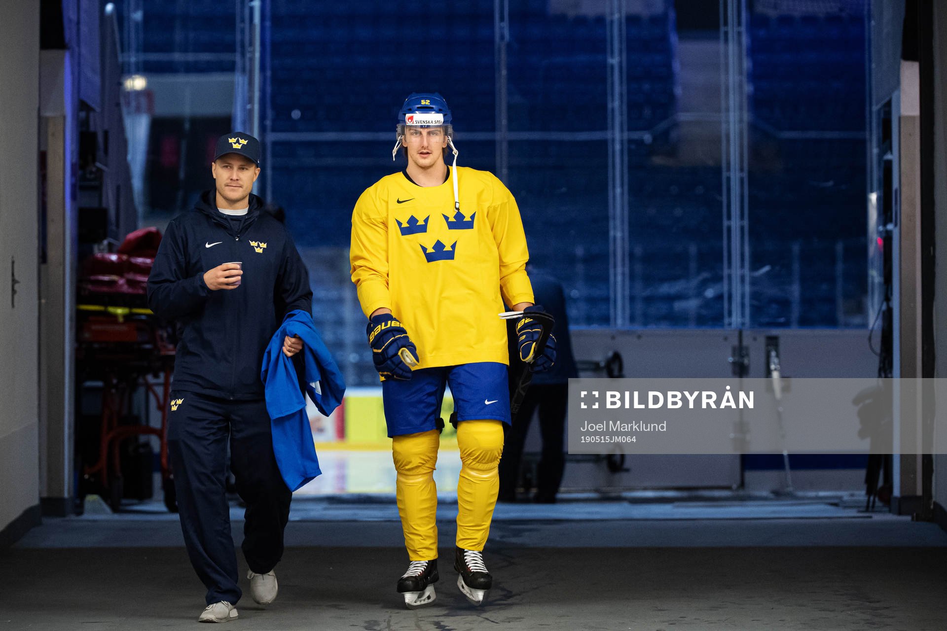 Physiotherapist Markus Hast and Philip Holm of Sweden at a