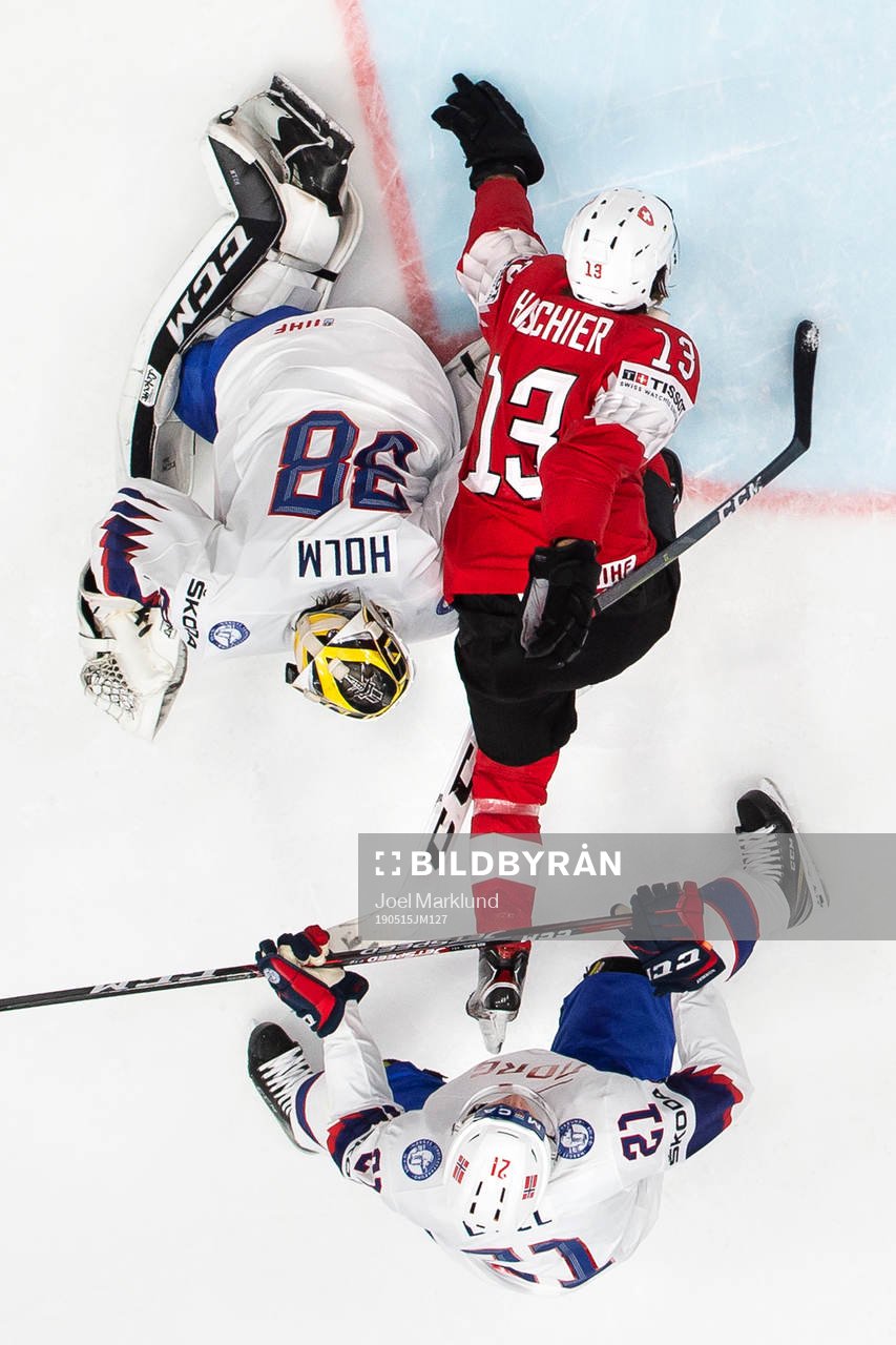 Goaltender Henrik Holm and Christian Bull of Norway in