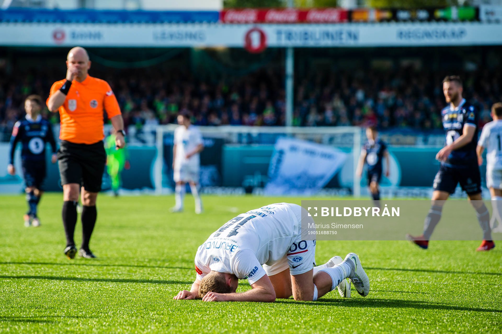 Erling Knudtzon of Molde in pain