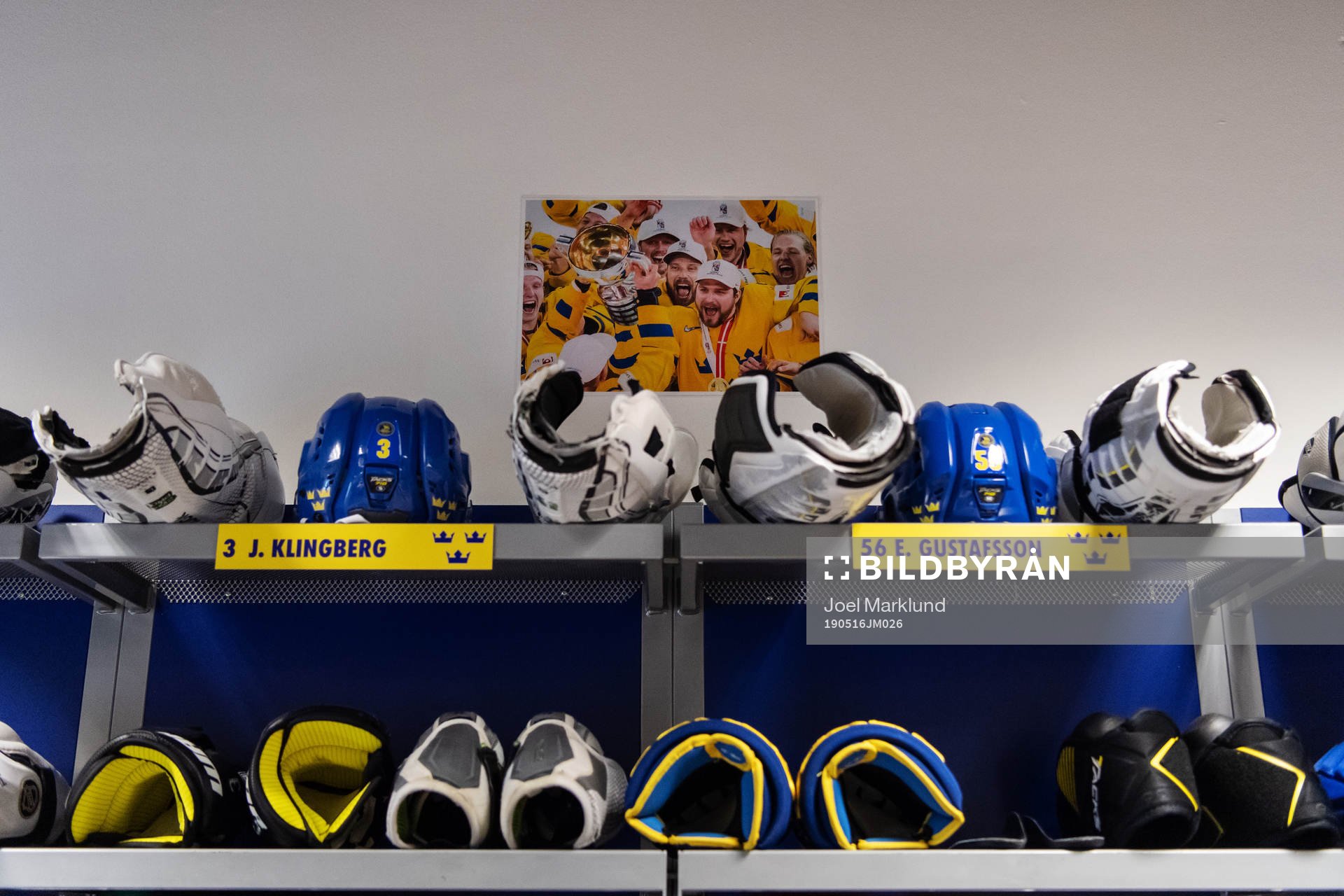A celebratory photo is seen above the changing area of John