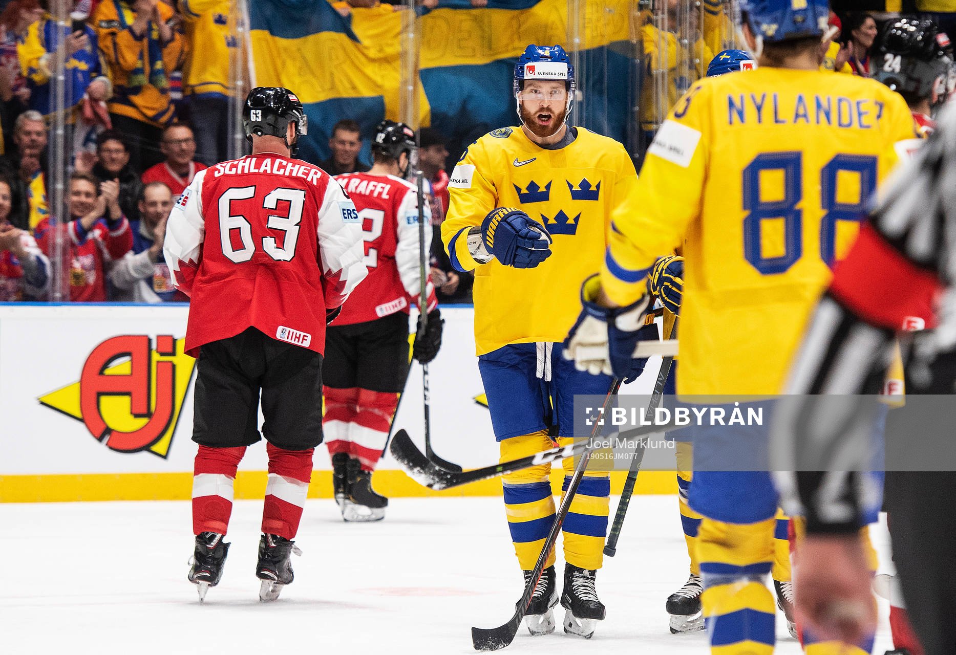 Adam Larsson and William Nylander of Sweden celebrates