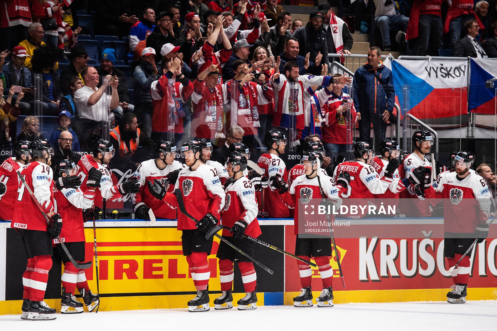 Michael Raffl of Austria celebrates with teammates