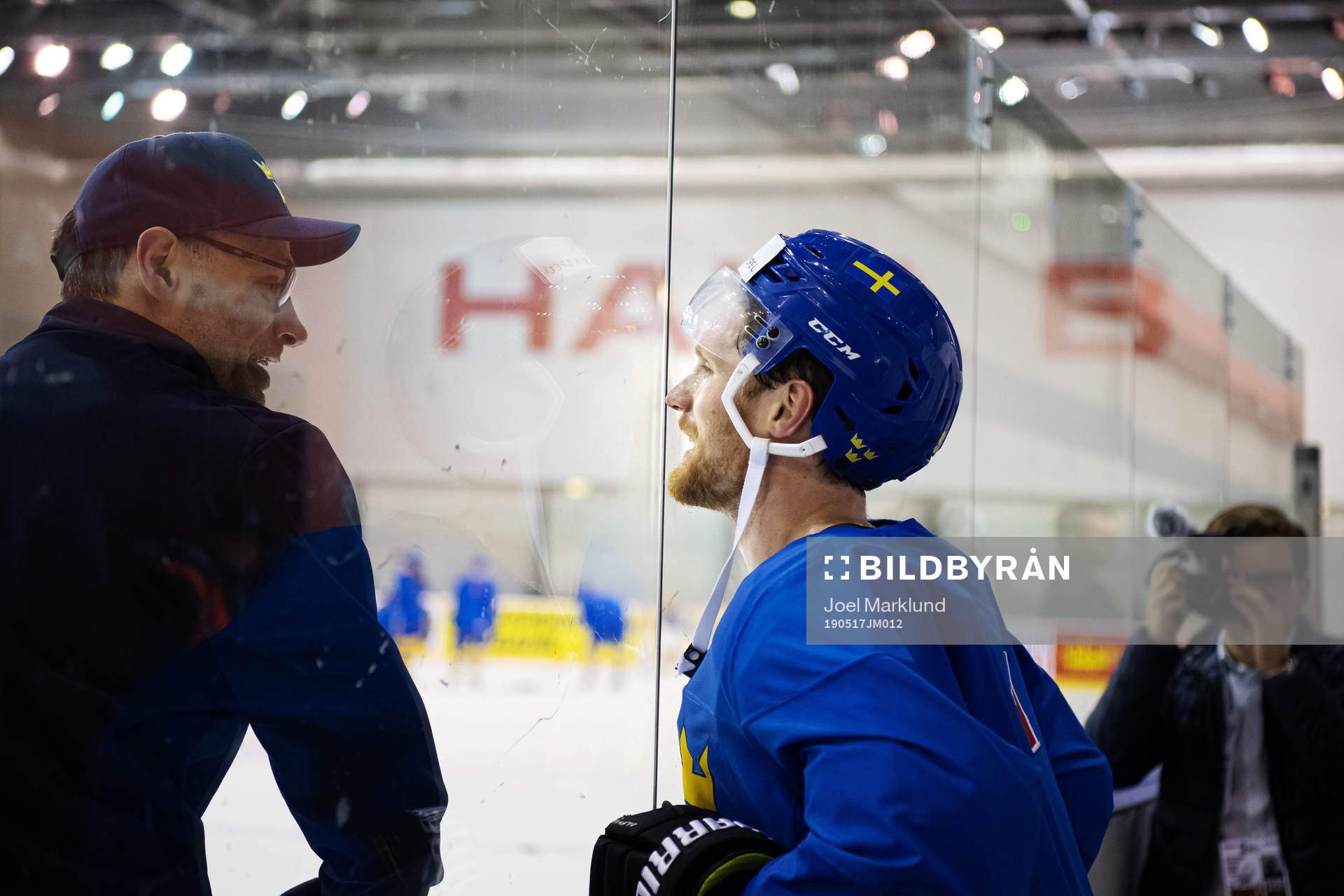 Assistant coach Peter Popovic and Gabriel Landeskog of
