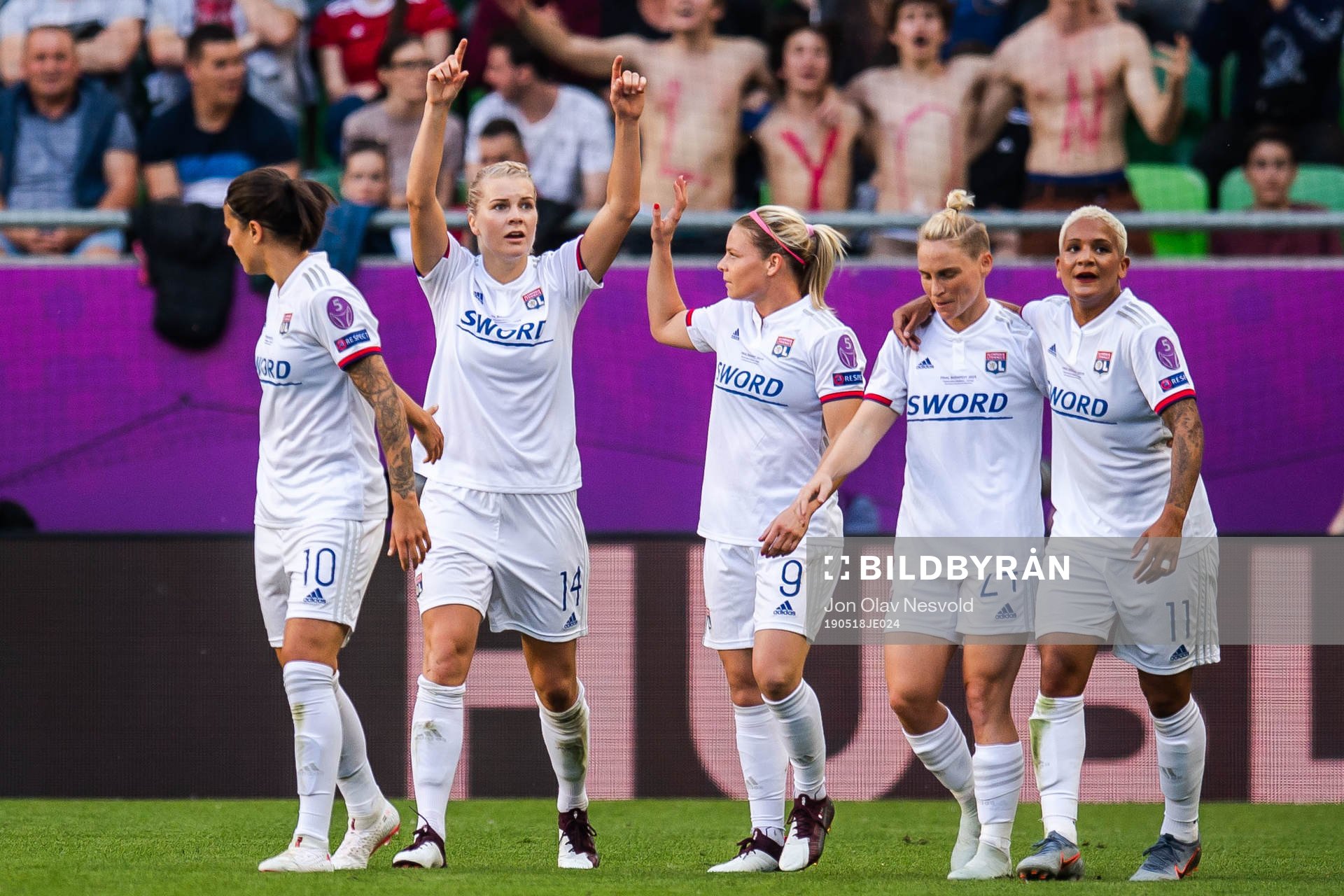 Ada Hegerberg of Lyon celebrate with Dzsenifer Marozsá,