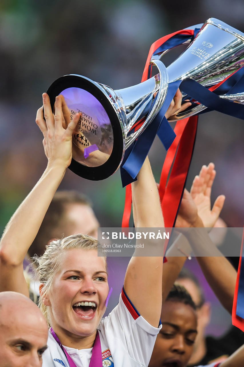 Ada Hegerberg of Lyon lifts the trophy