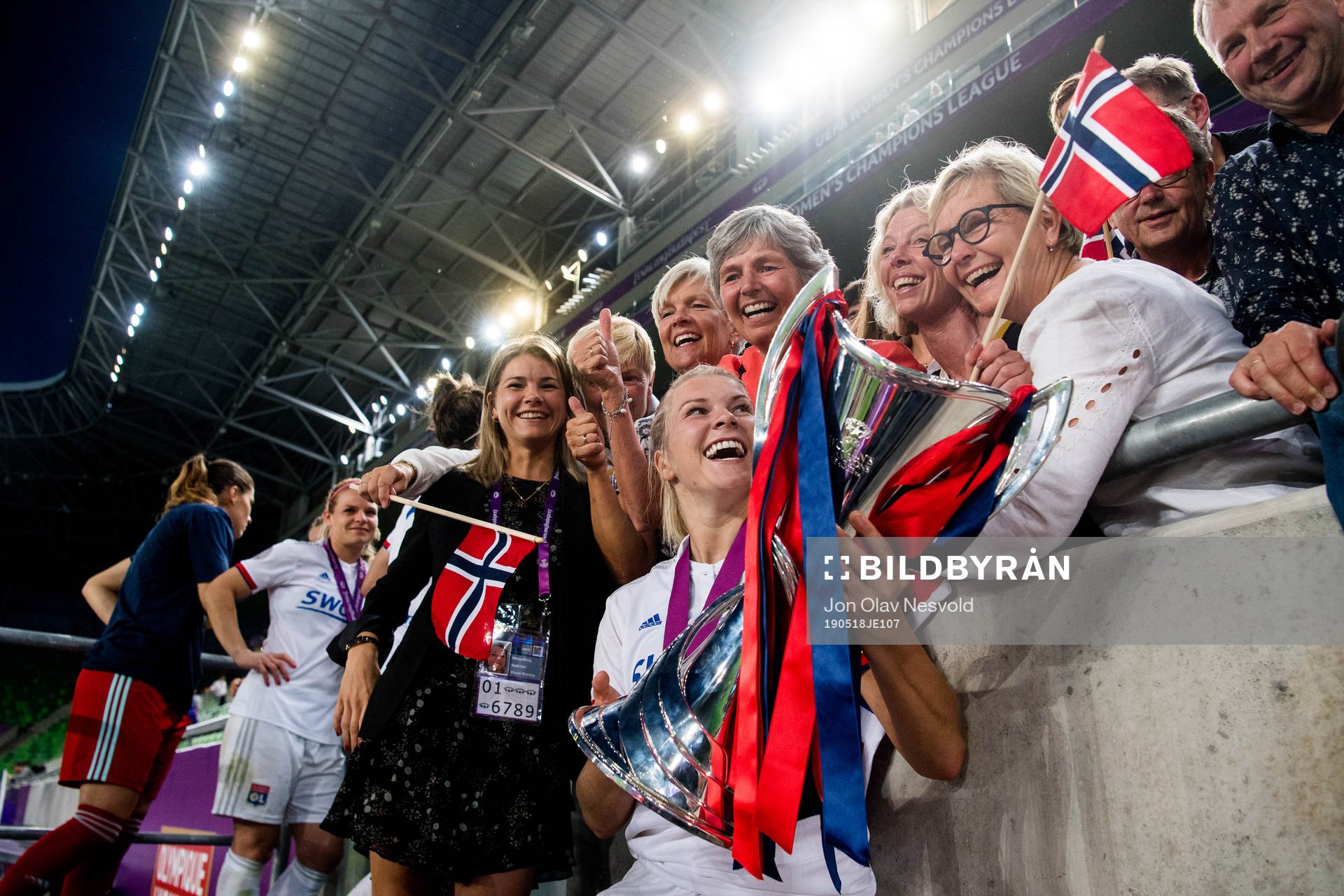Ada Hegerberg of Lyon celebrates with her sister Andrine Hegerberg, mother Gerd Stolsmo and father Stein Erik Hegerberg after the UEFA Women's Champions League final match between Lyon and Barcelona on May 18, 2019 in Budapest.