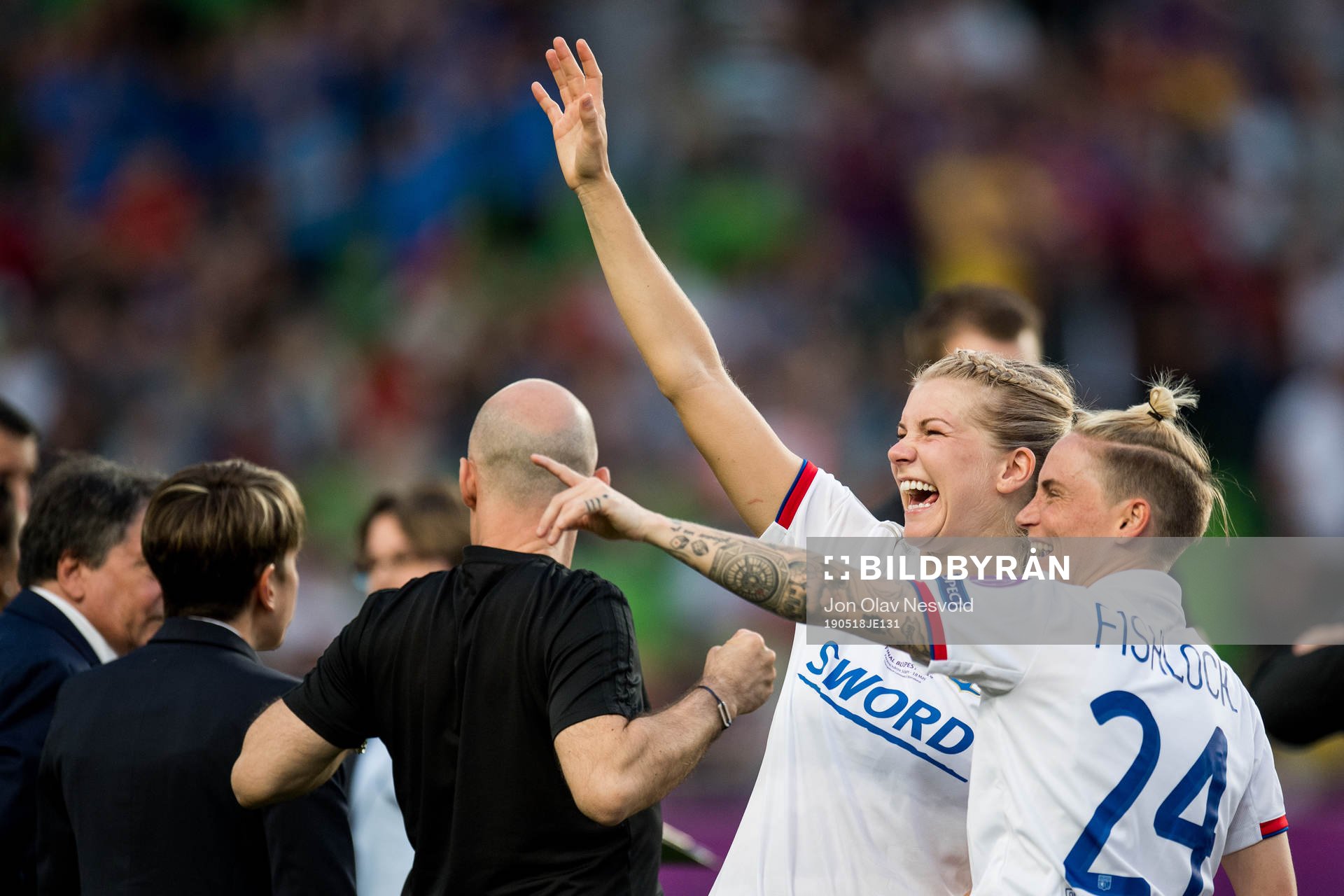Ada Hegerberg and Jess Fishlock of Lyon celebrate