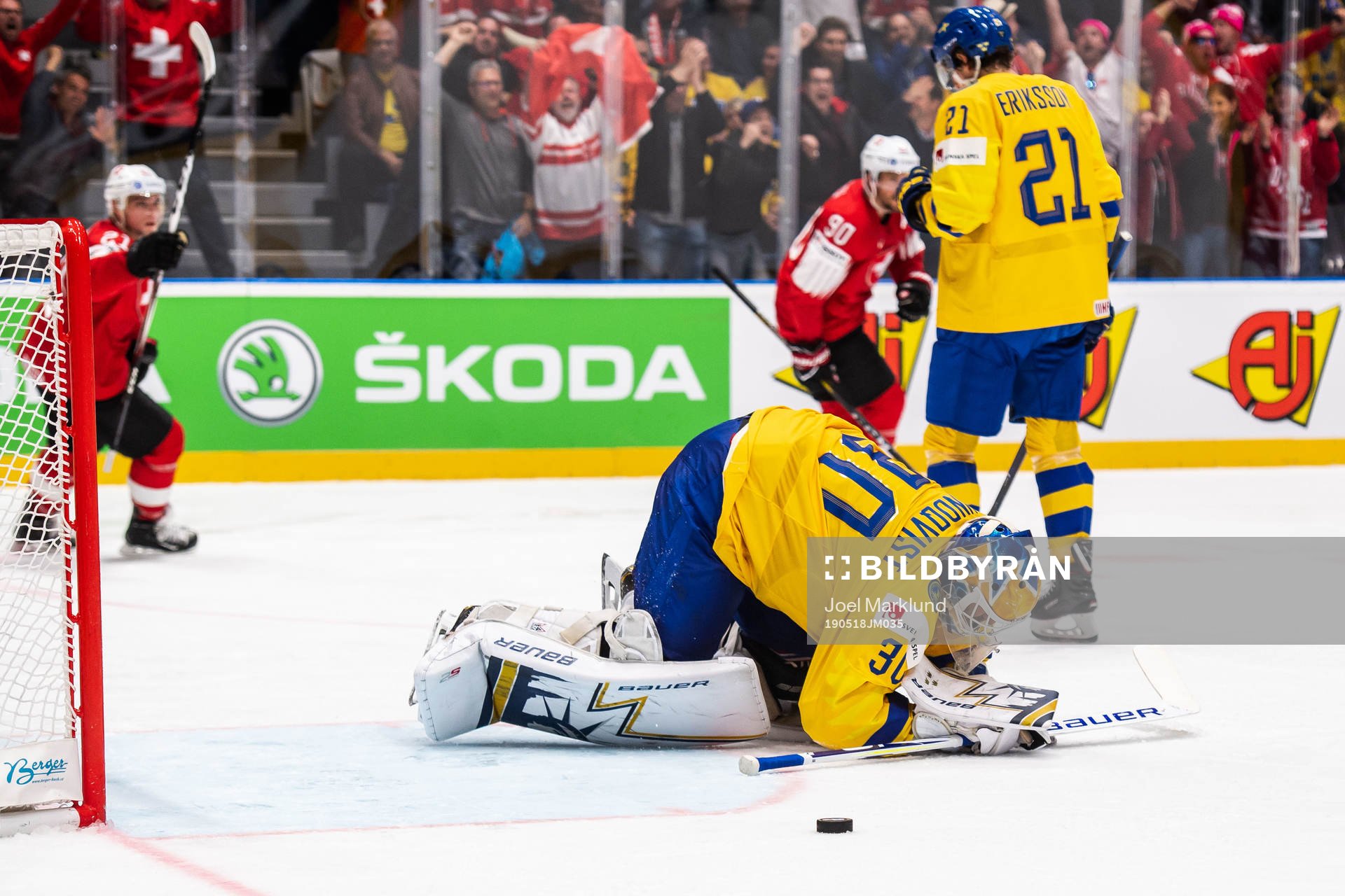 Goaltender Henrik Lundqvist of Sweden looks dejected