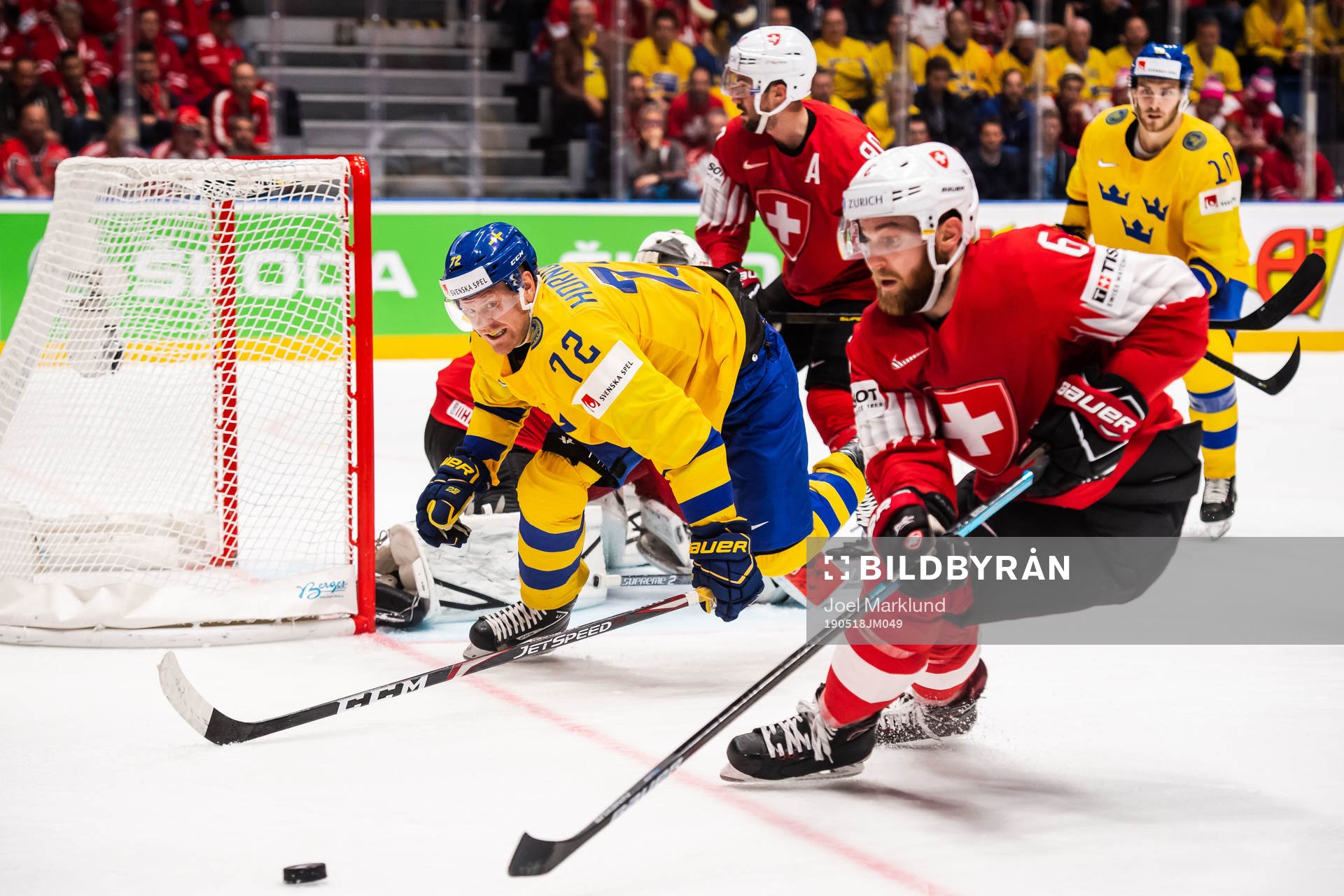 Patric Hörnqvist of Sweden and Yannick Weber of Switzerland